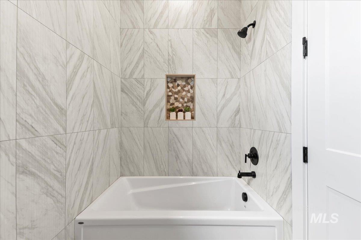 Bathroom with bathtub / shower combination