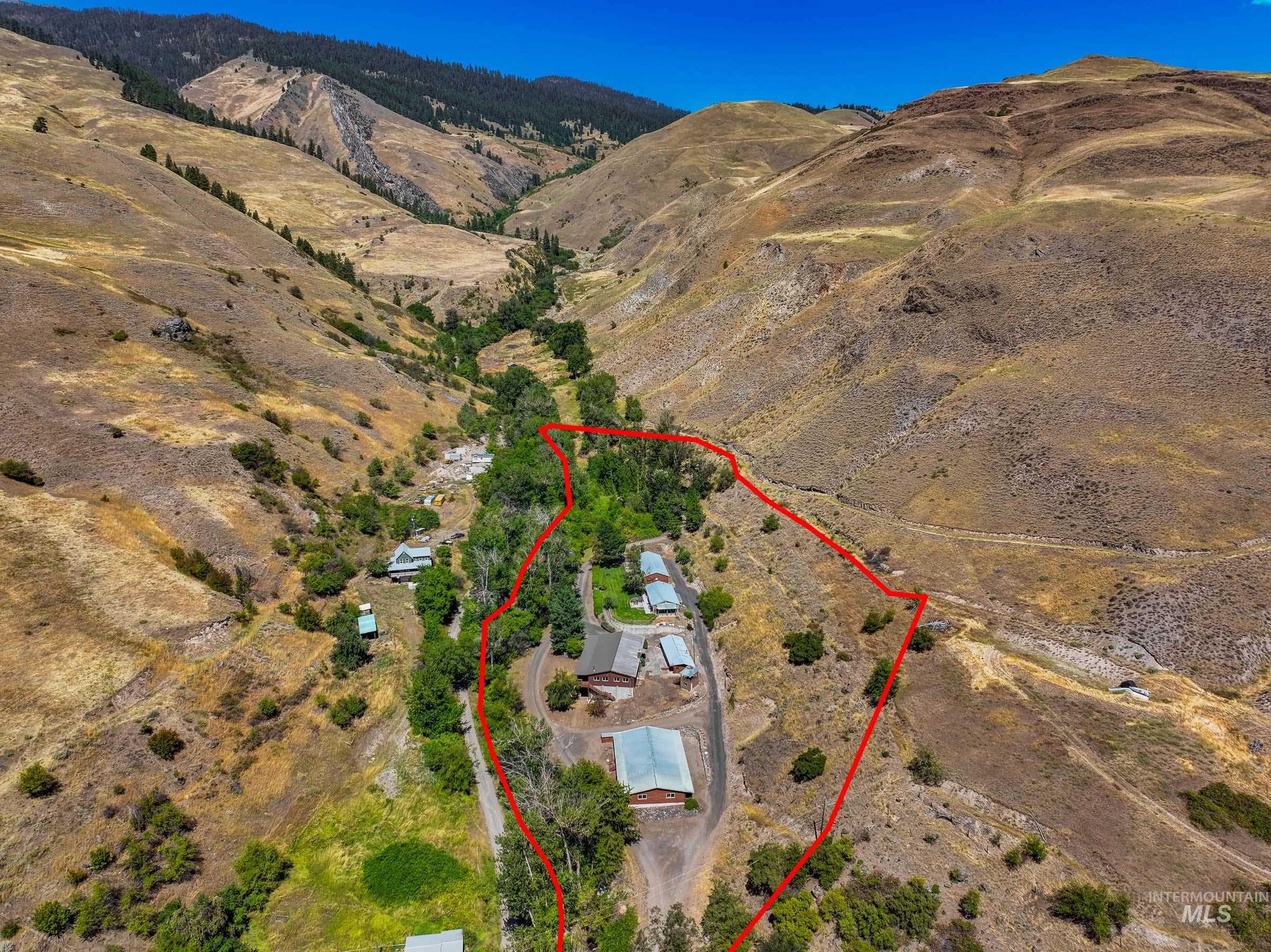 View of property location with property boundaries highlighted and rural landscape