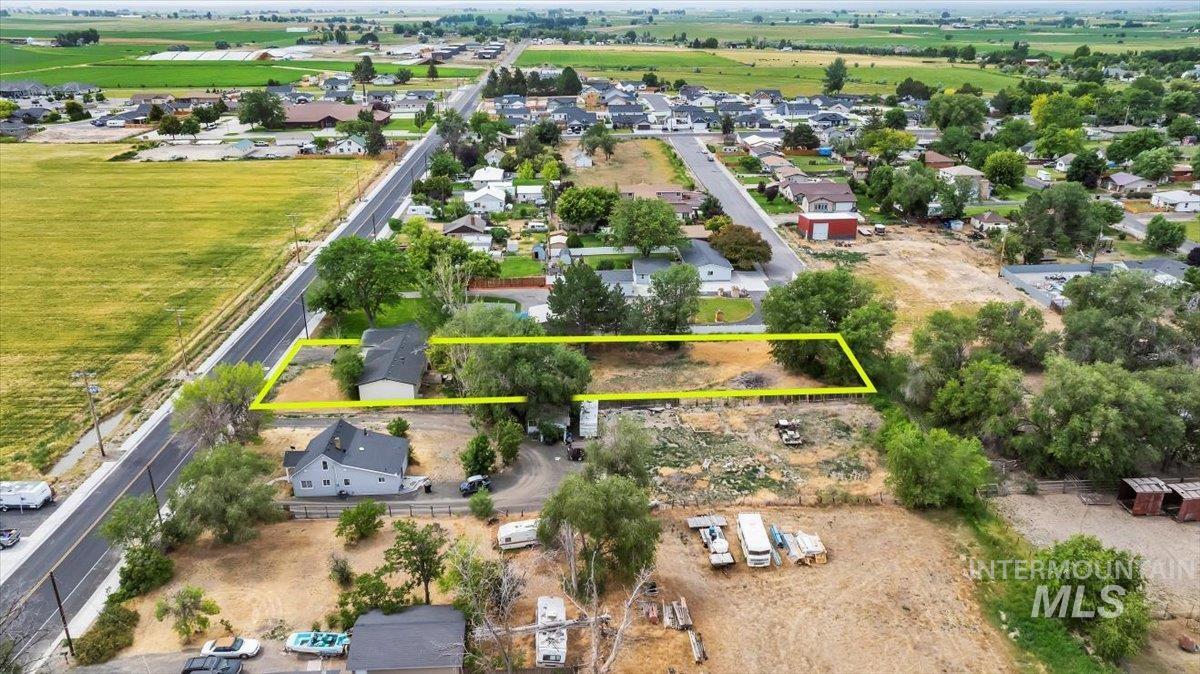Aerial perspective of suburban area with property boundaries highlighted