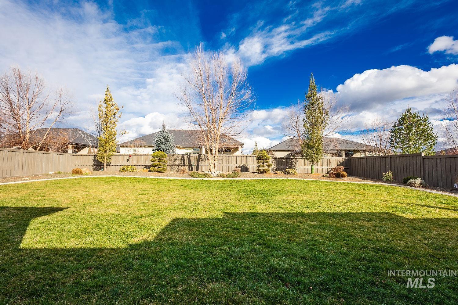 View of fenced backyard