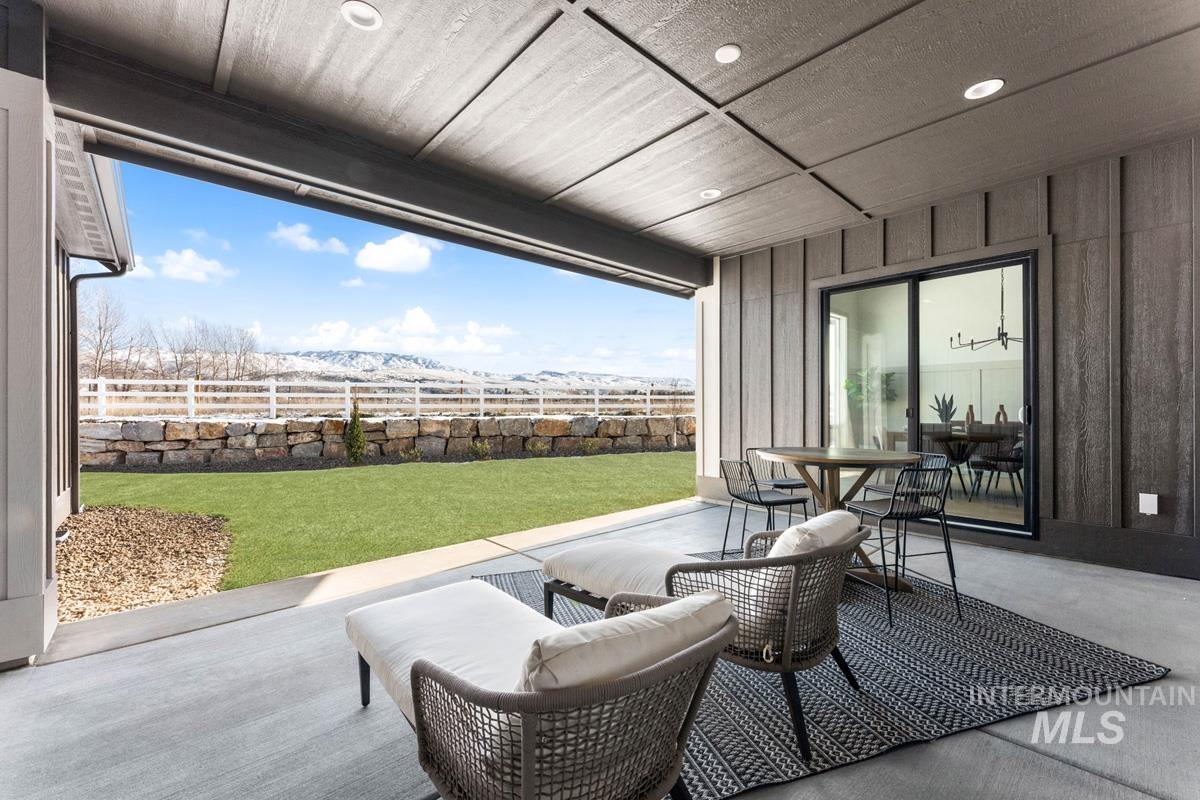 Fenced backyard with a patio area