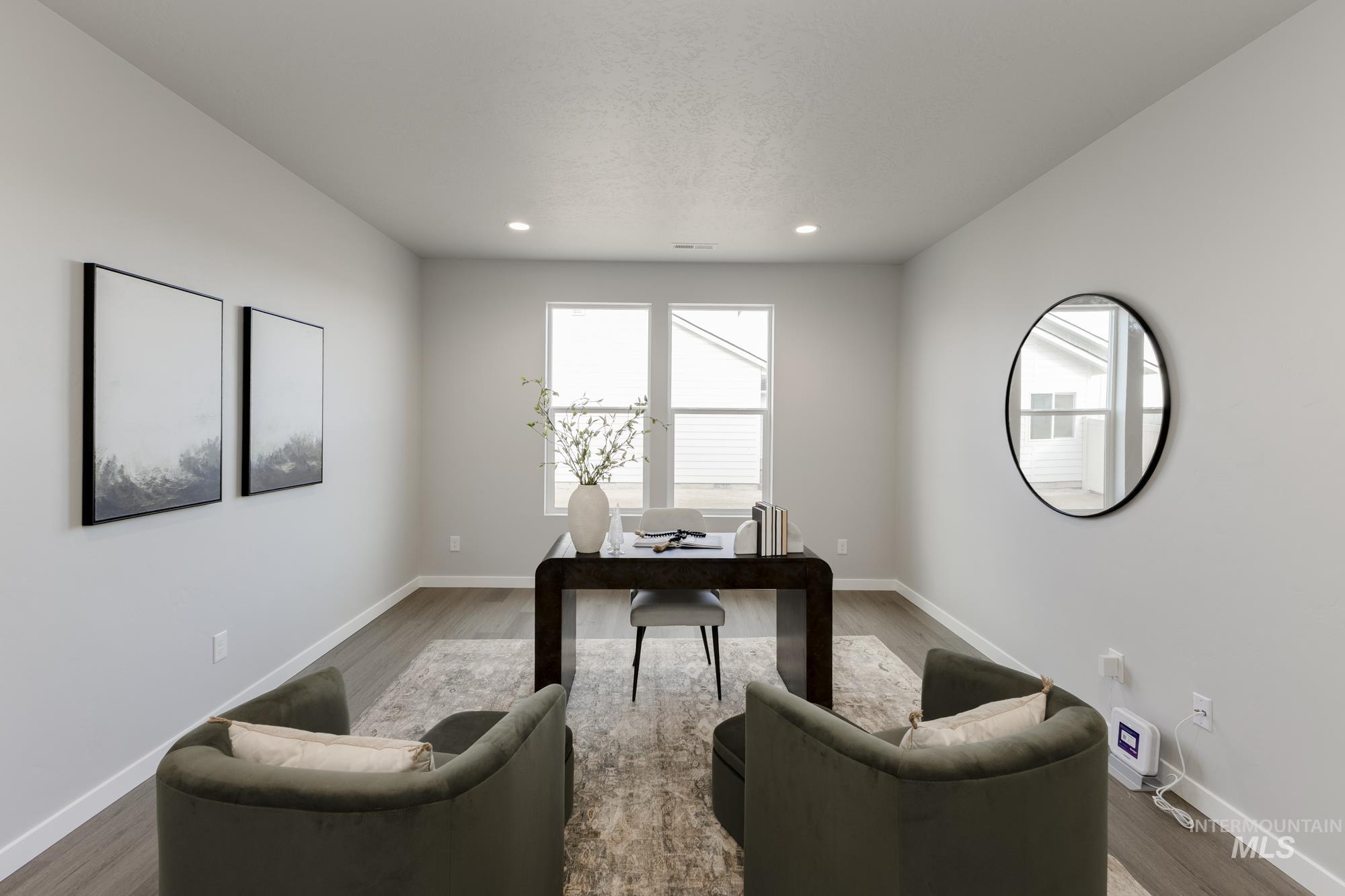 Office featuring recessed lighting and wood finished floors