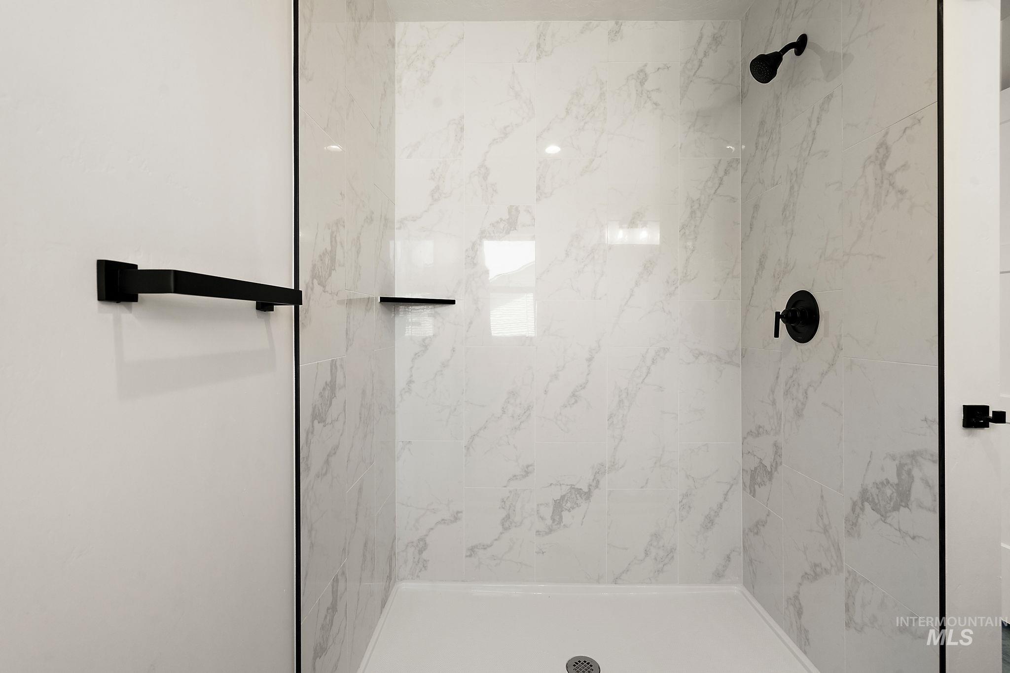 Bathroom with a tile shower