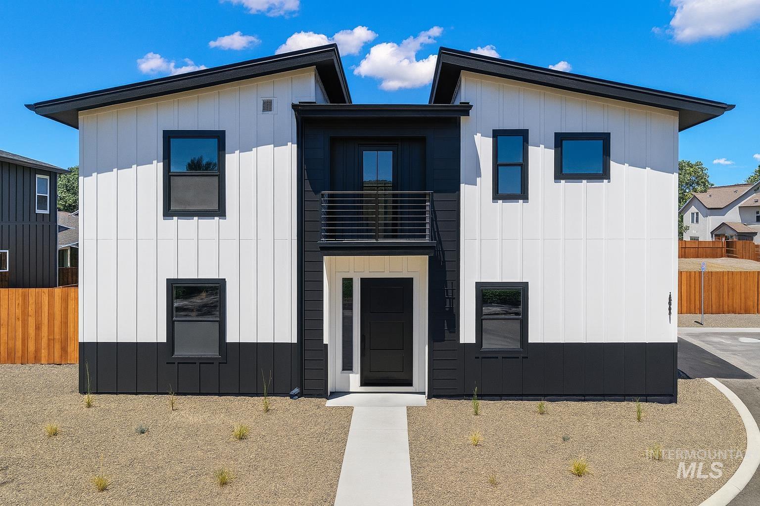 View of front of home featuring board and batten siding