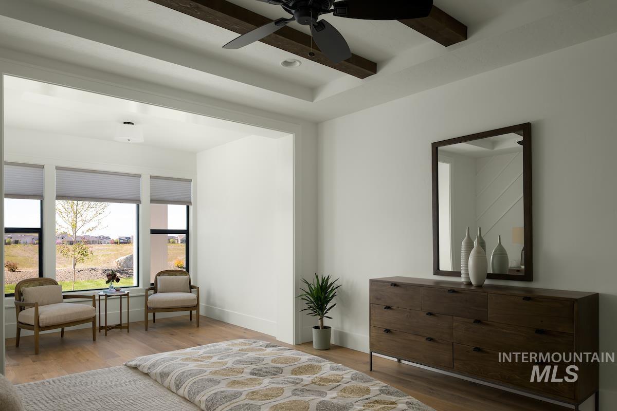 Bedroom with wood finished floors, a ceiling fan, and recessed lighting
