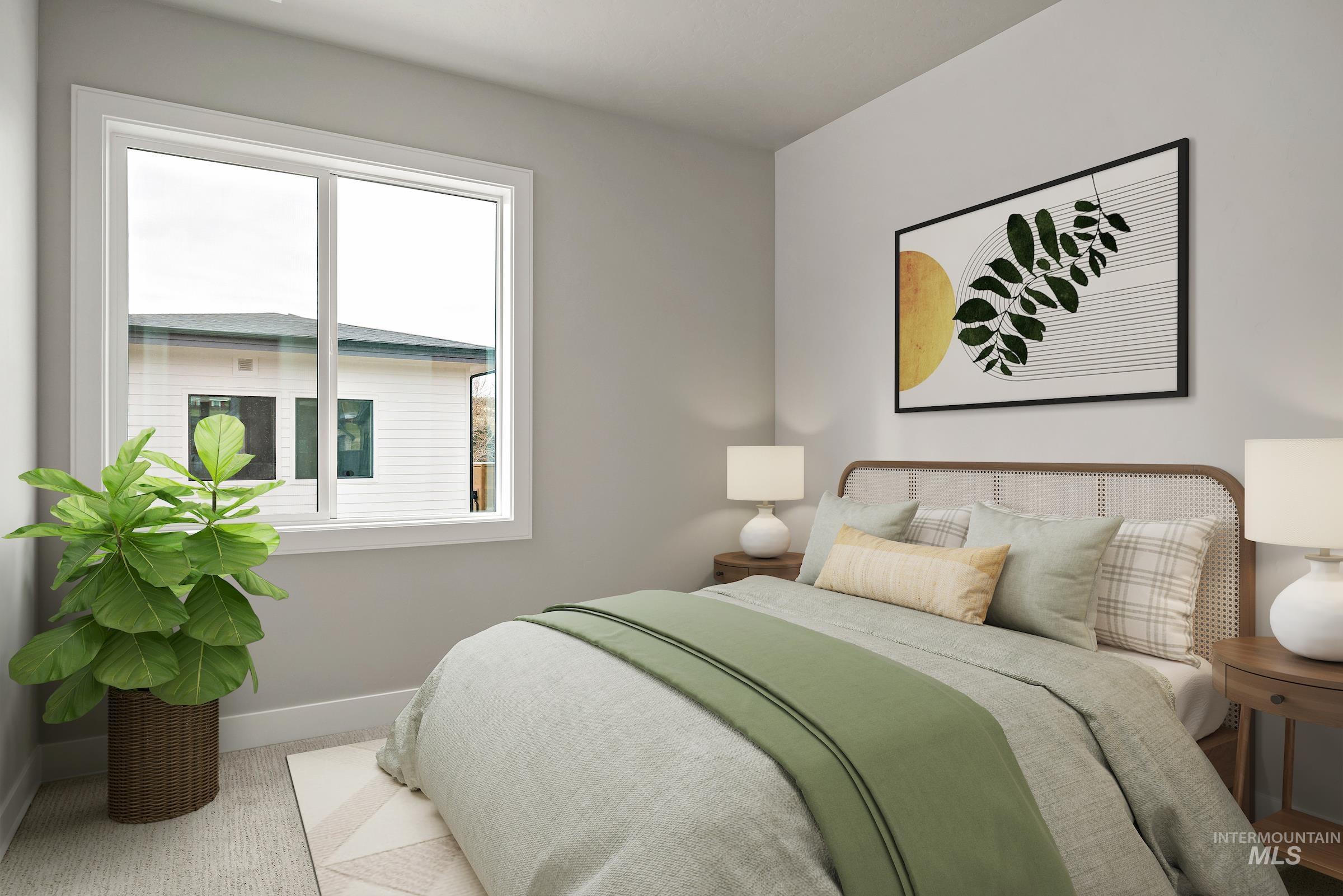 Carpeted bedroom with baseboards