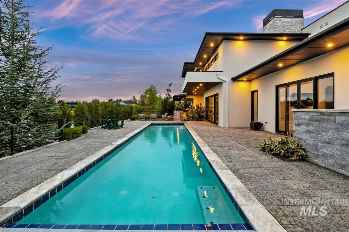 Outdoor pool with a patio area