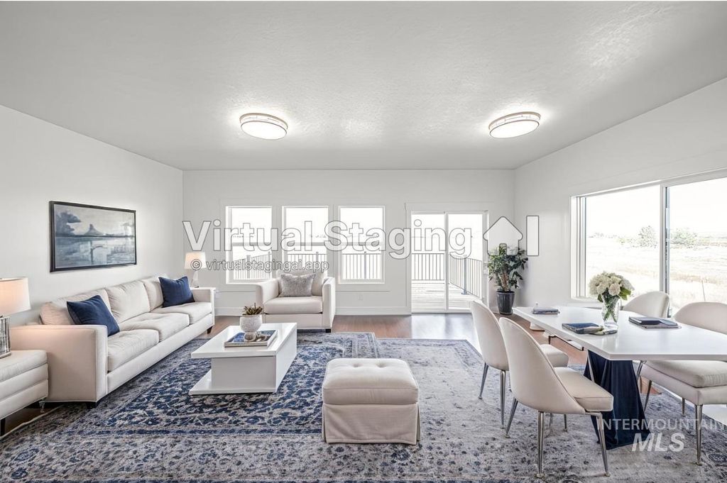 Photo of 102 N Stocktrail Dr, Rigby, ID 83442 (MLS # 98973204)