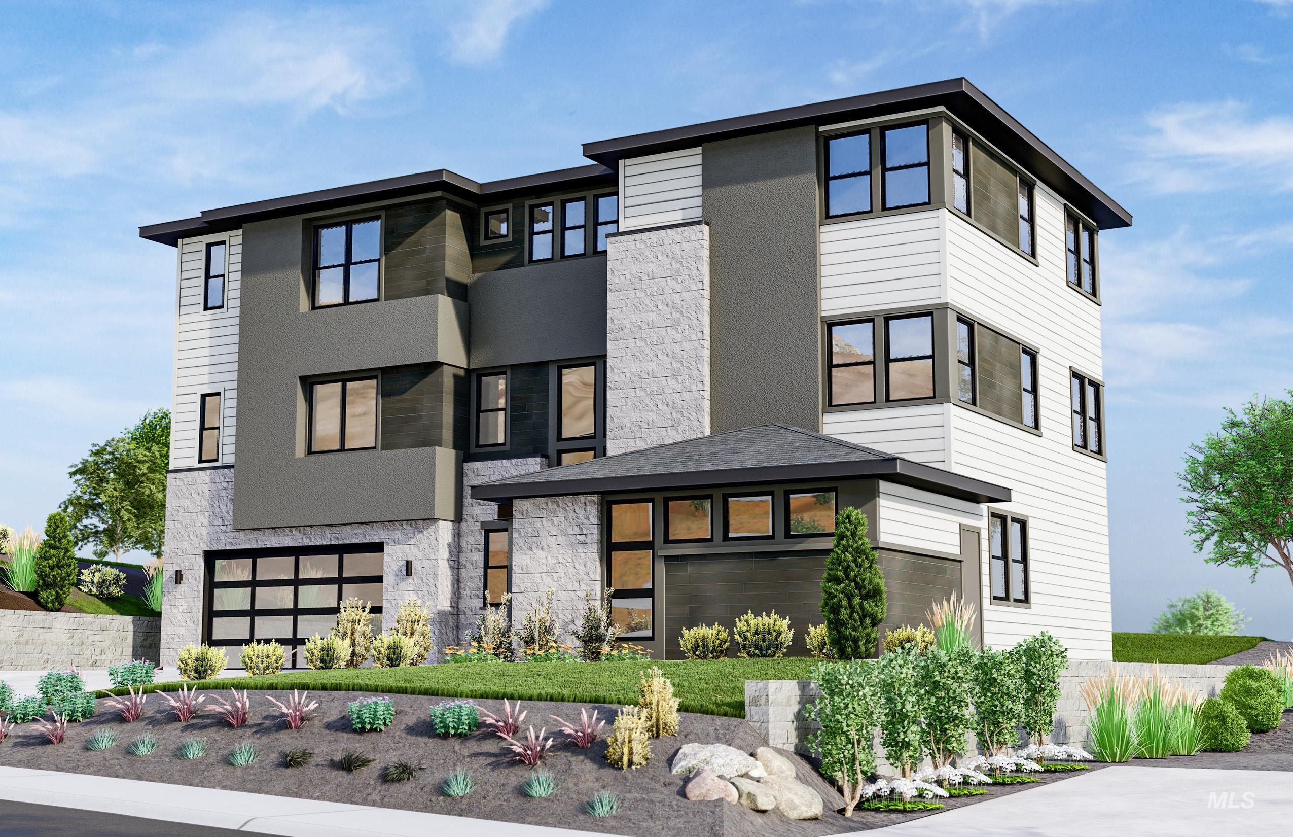 View of front facade with stone siding, stucco siding, and a garage