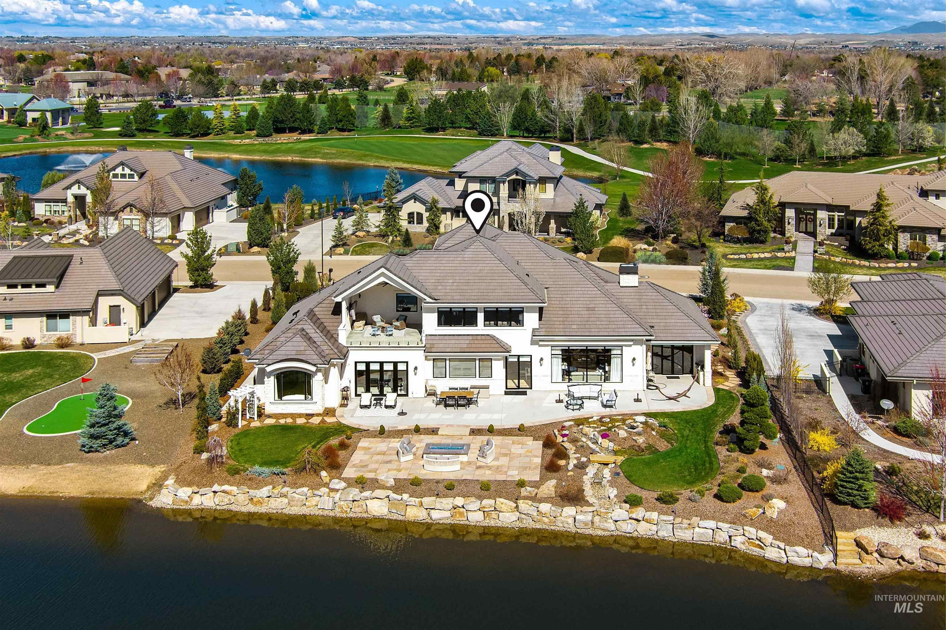 Aerial view of residential area with a large body of water