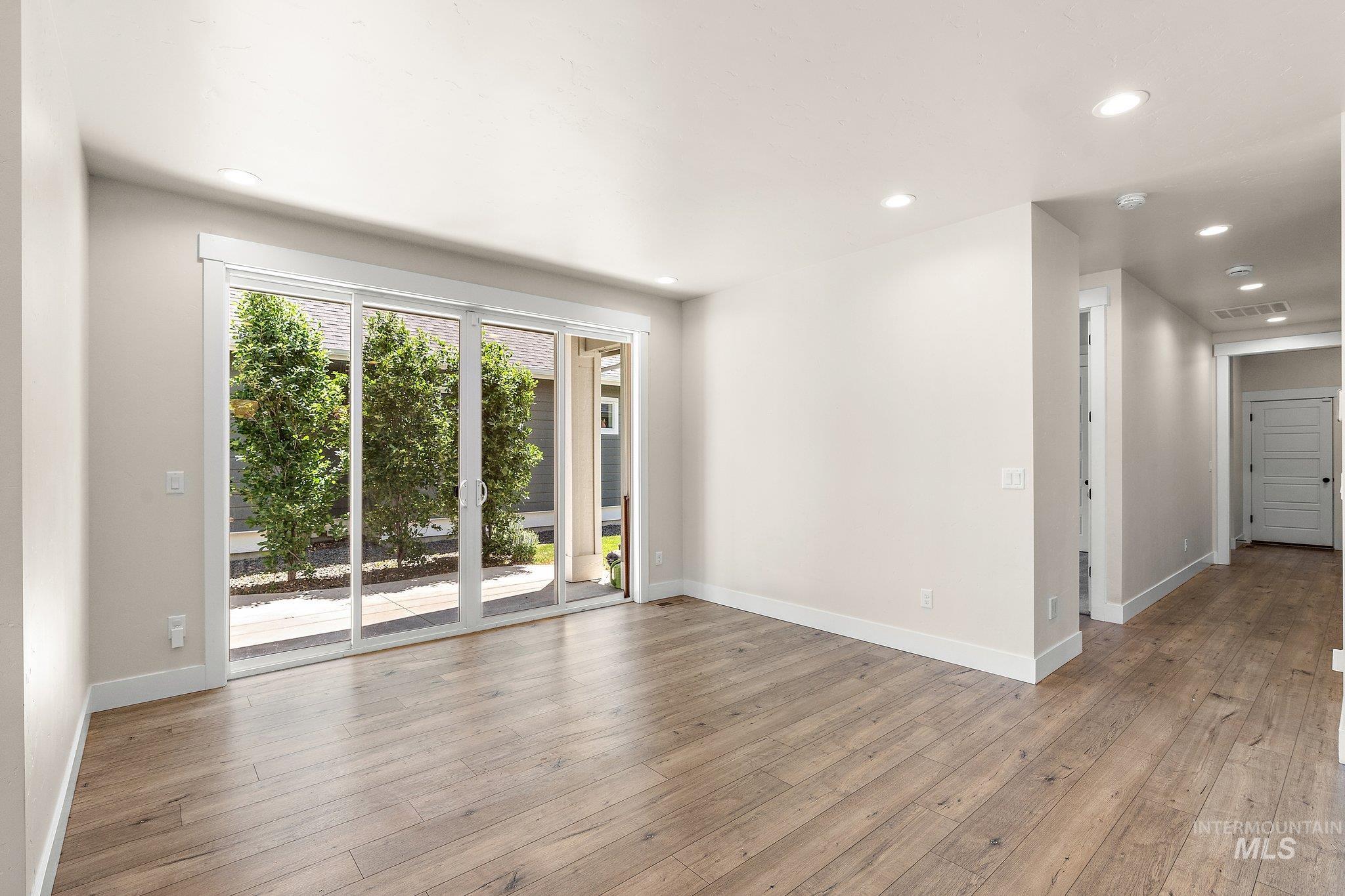 Unfurnished room featuring recessed lighting and light wood-style flooring