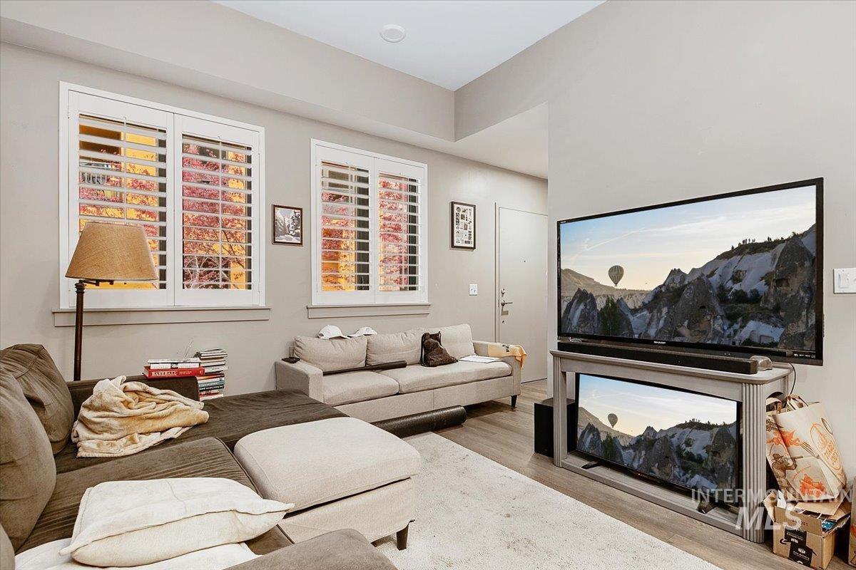 Living area featuring light wood-style flooring
