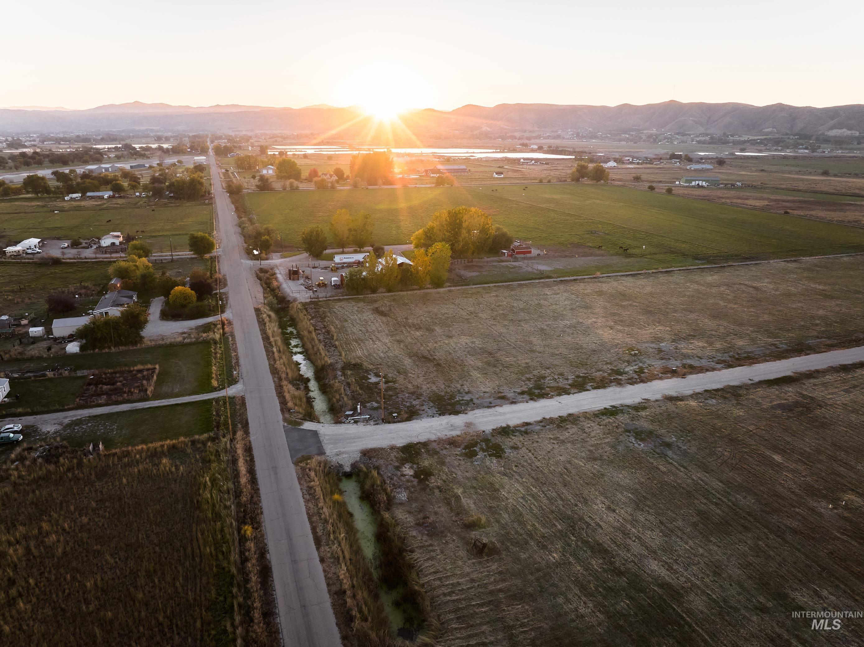Aerial view at dusk of a view of countryside and a mountain view