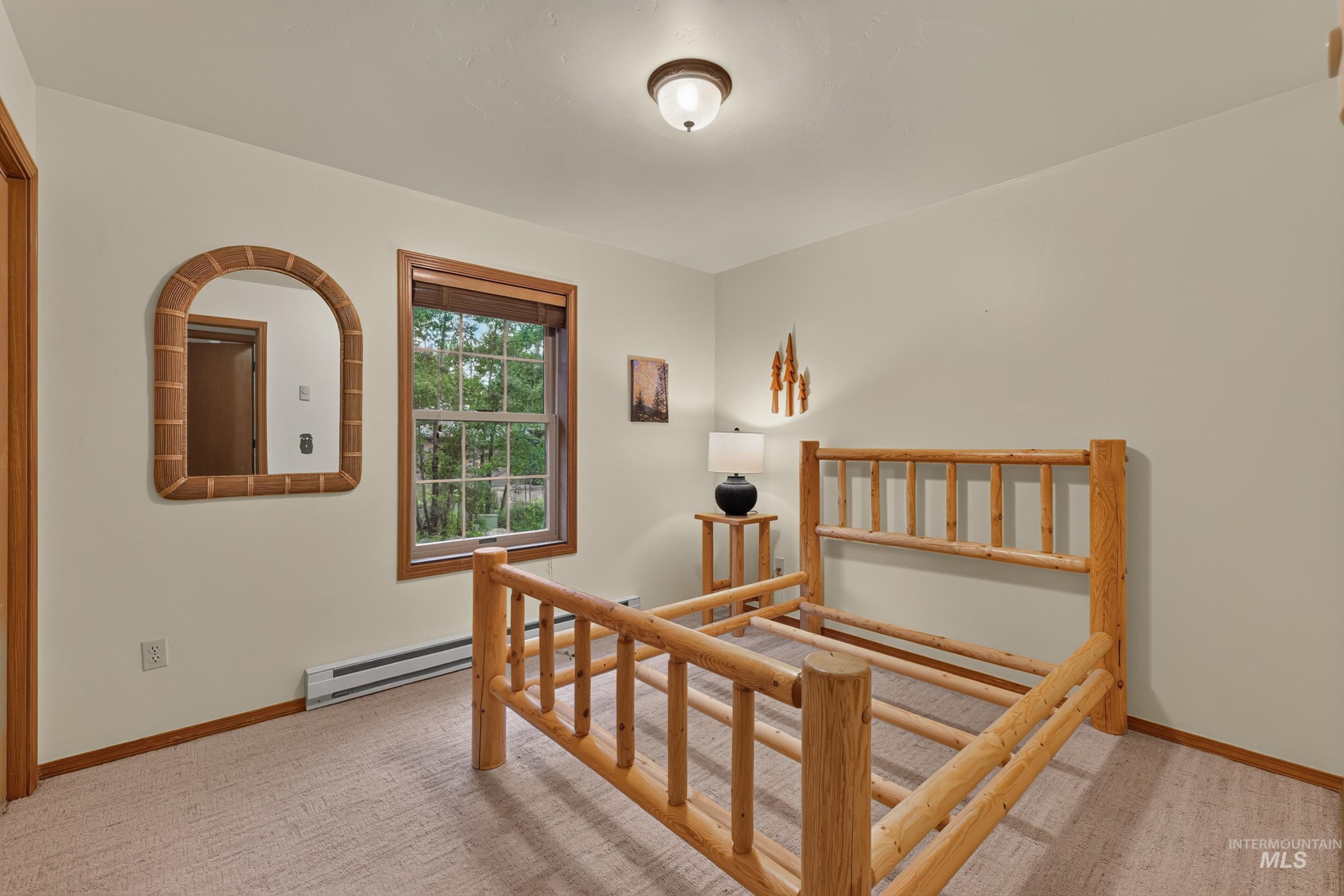 Neutral-toned walls complement a carpeted floor