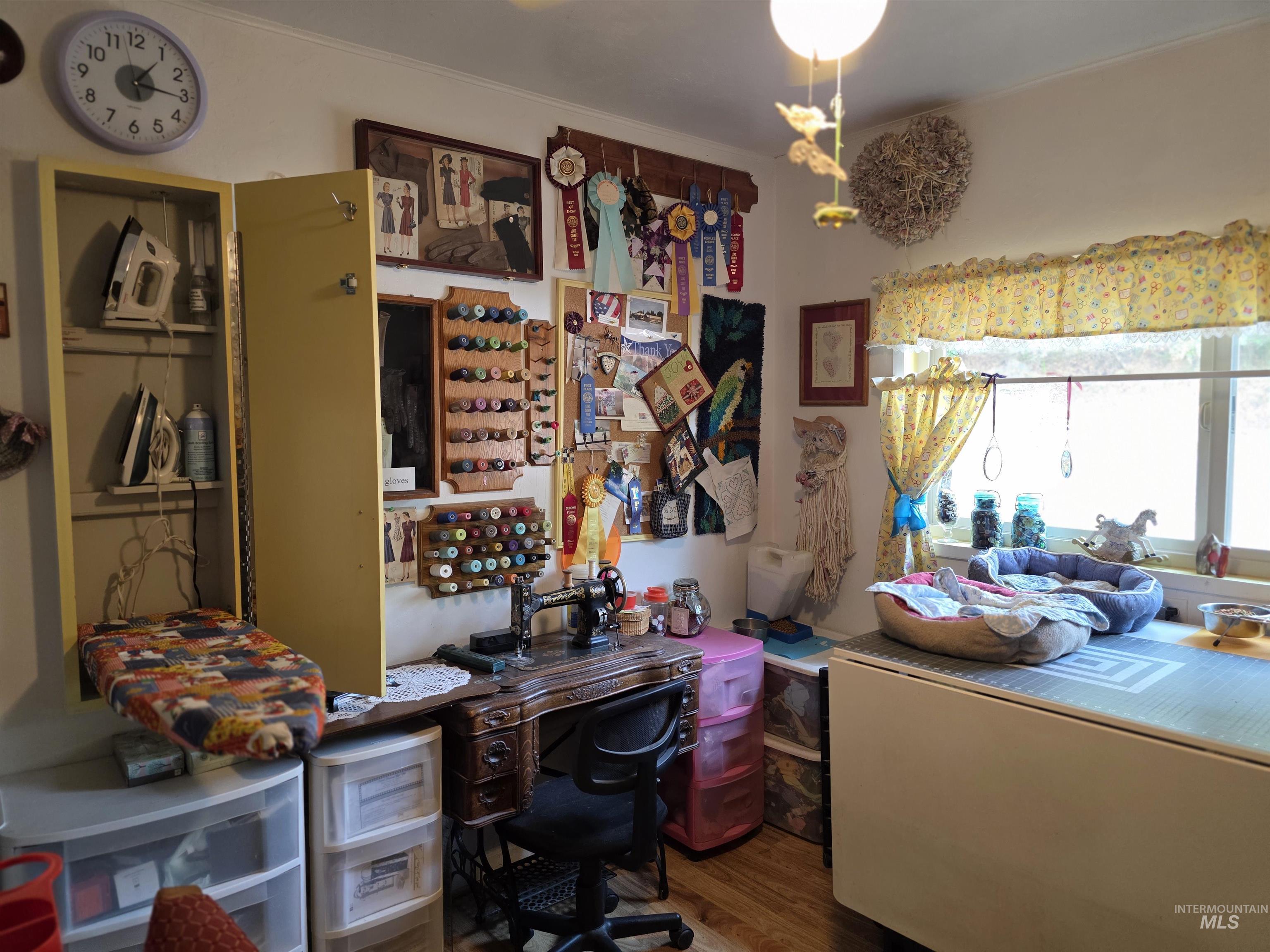 Office area with dark wood finished floors