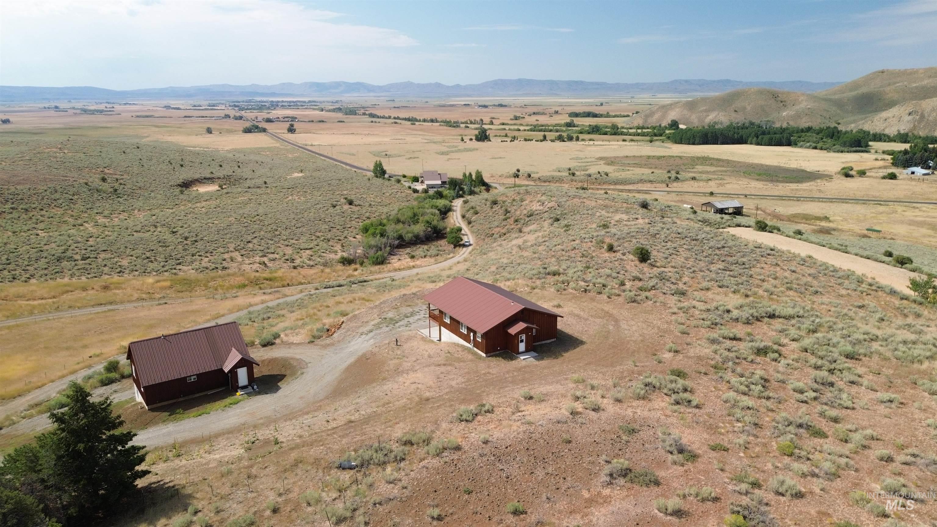 Aerial view of sparsely populated area with mountains