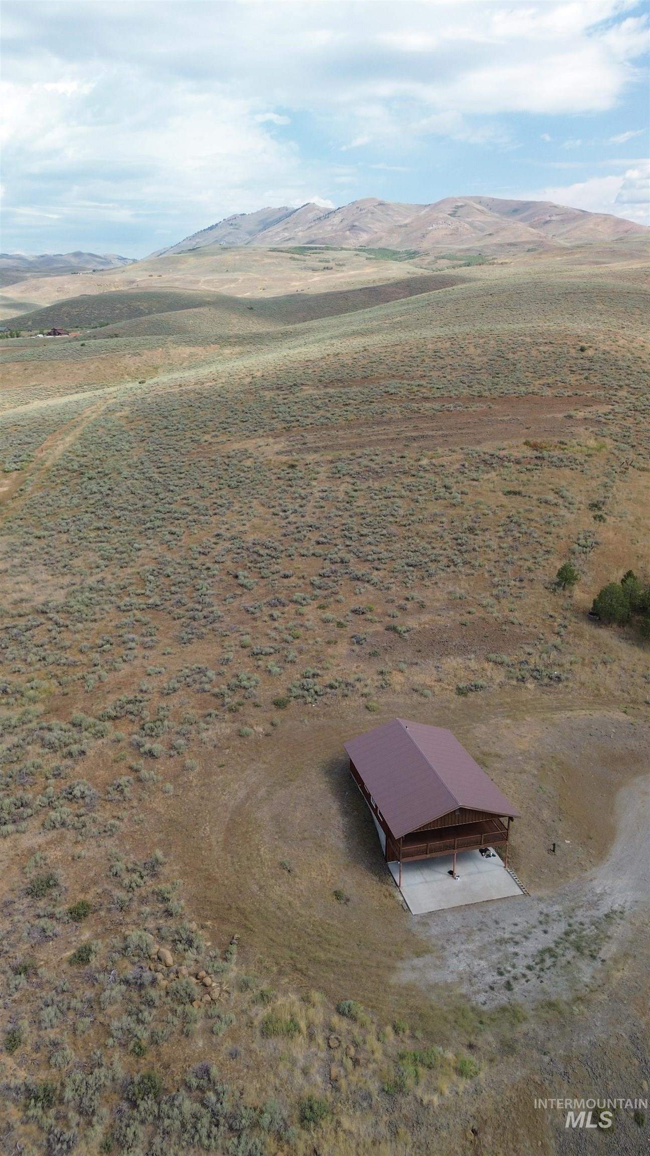 View of rural area with a mountainous background