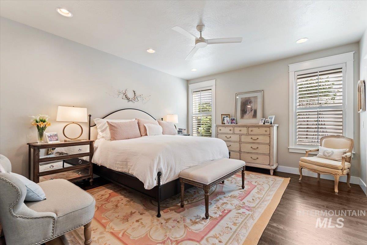 Bedroom featuring recessed lighting, wood finished floors, and ceiling fan