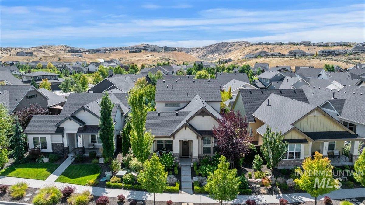 Aerial view of residential area with mountains