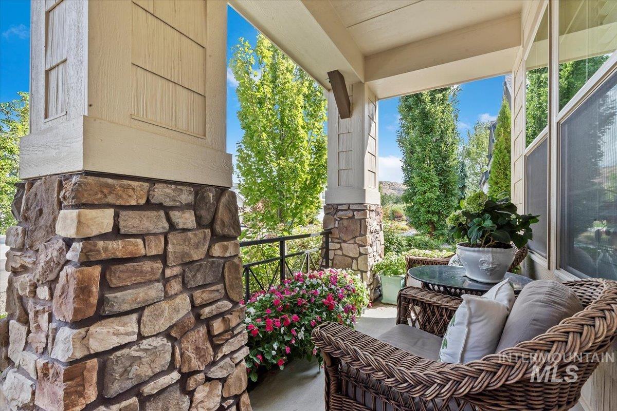 Balcony featuring a sunroom