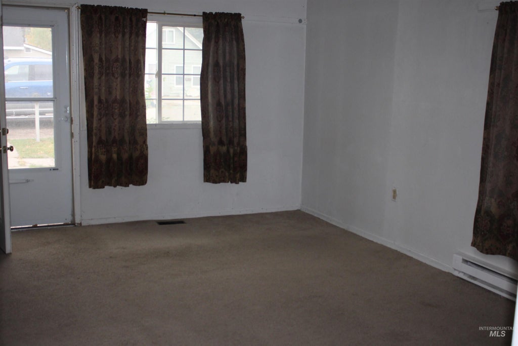 Photo of 909 2nd St, Rupert, ID 83350 (MLS # 99005232)