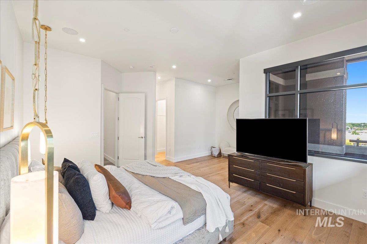 Bedroom featuring light wood finished floors and recessed lighting