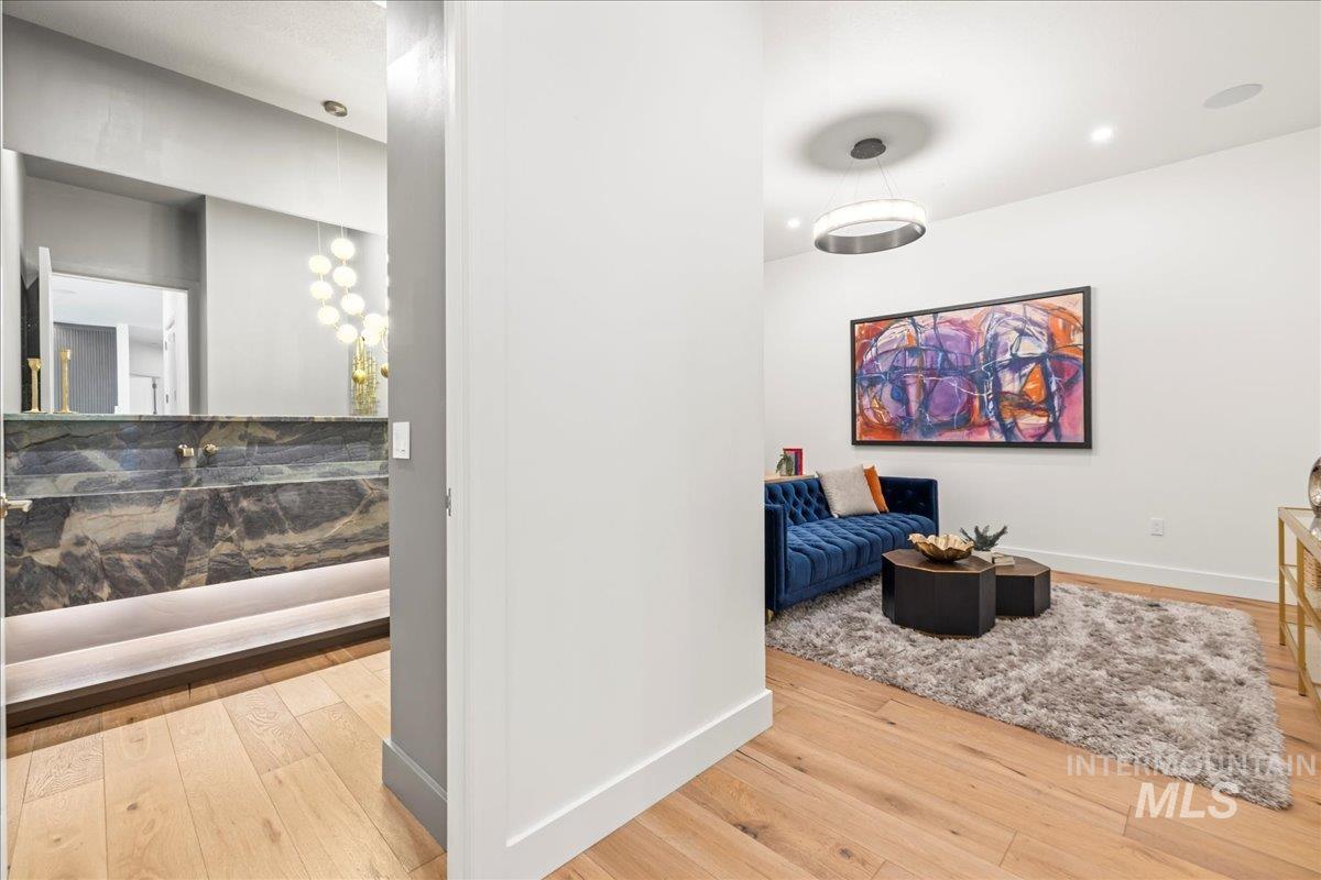 Hallway featuring wood finished floors