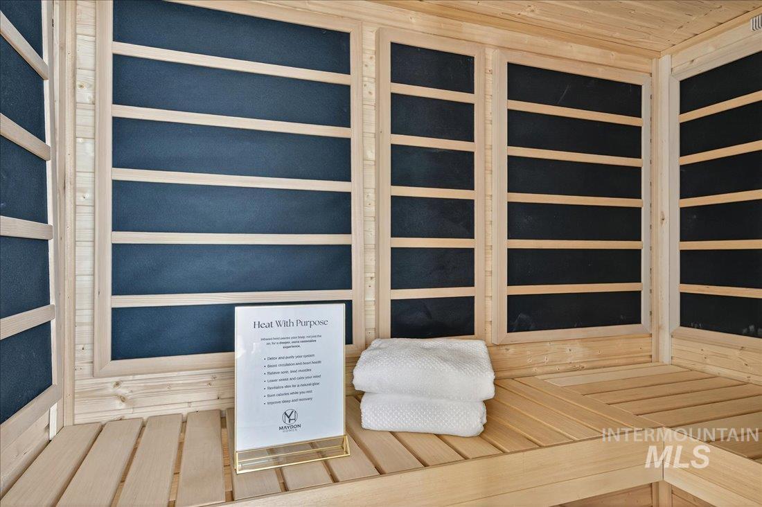 Relaxing sauna / steam room with wood ceiling