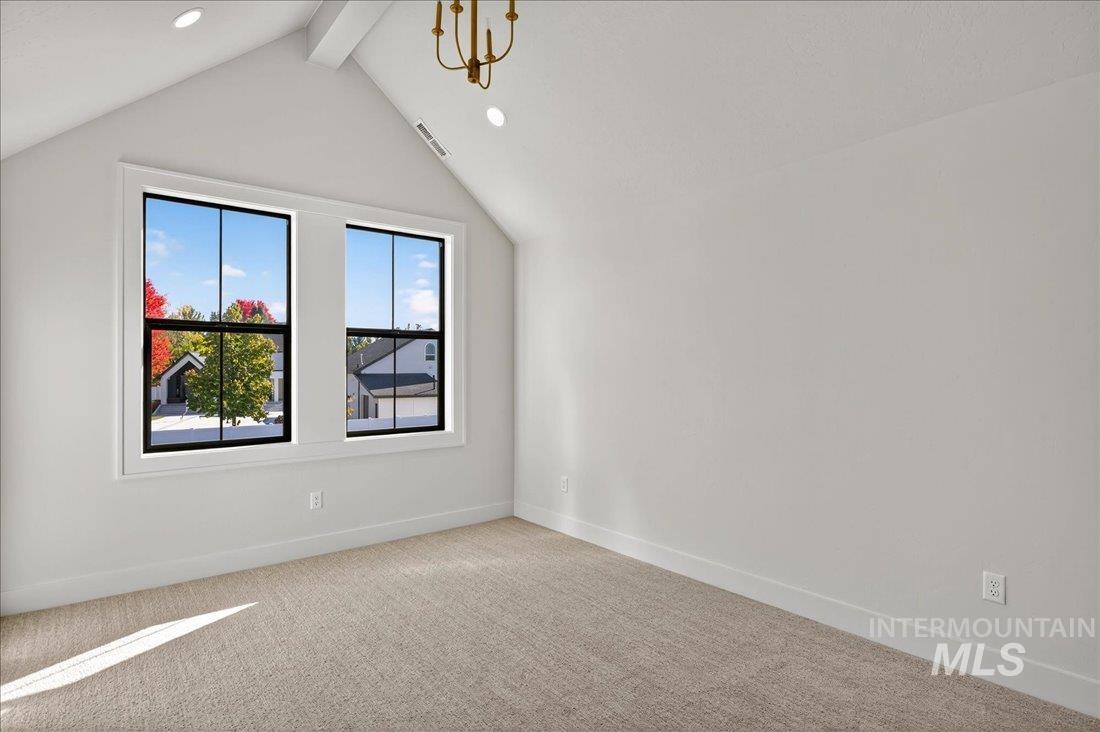 Additional living space featuring carpet flooring and recessed lighting