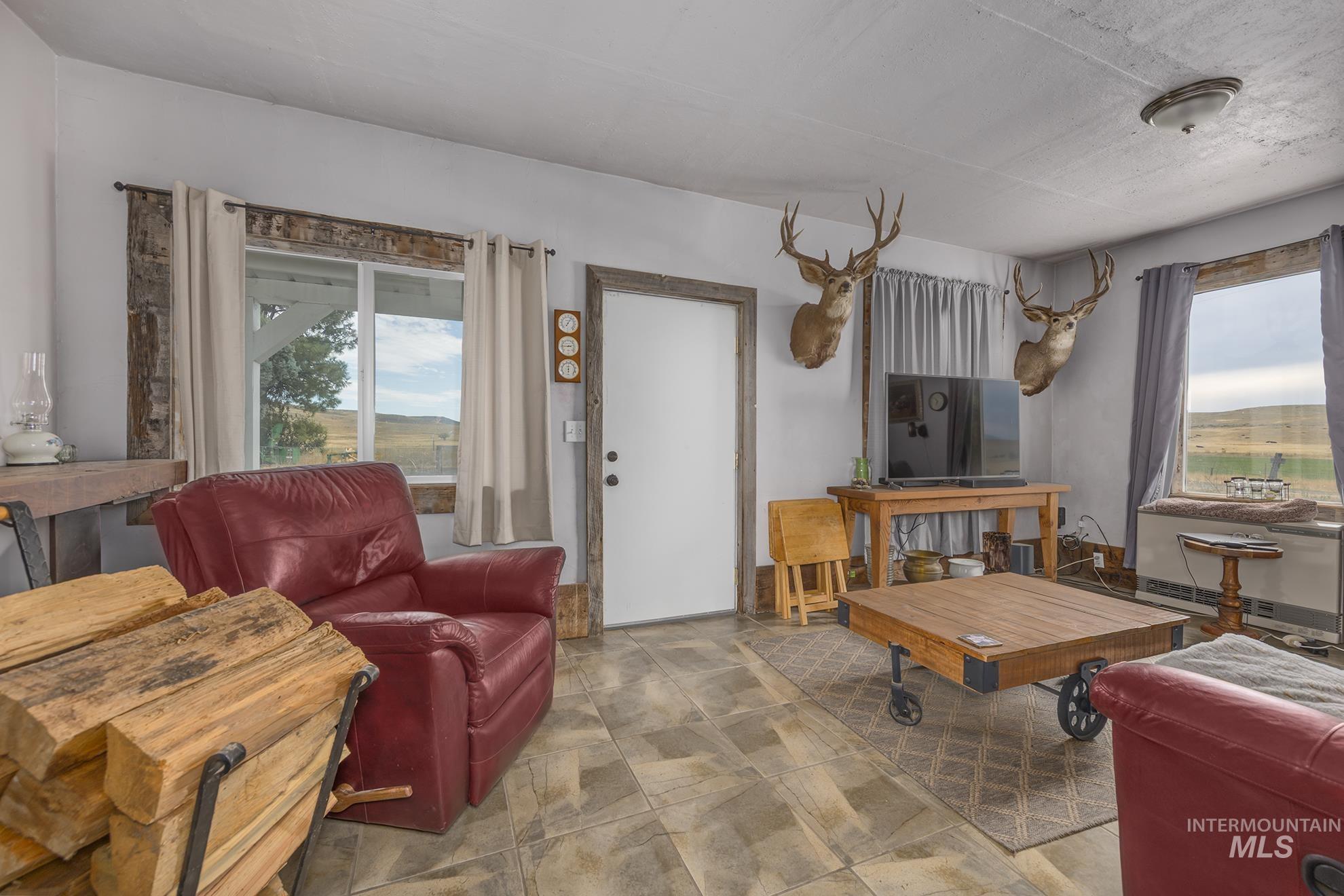 Living room with stone finish flooring