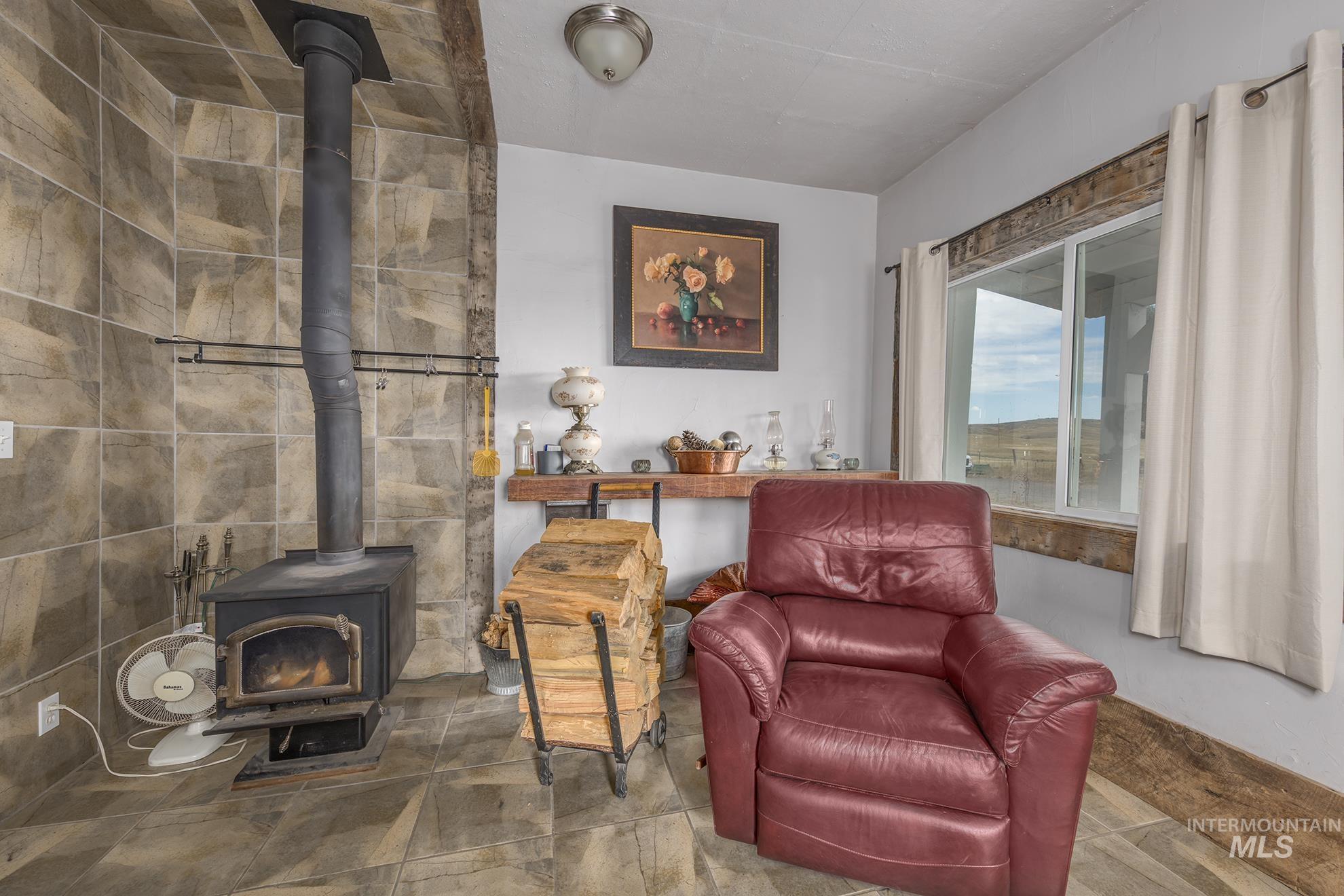 Living area featuring a wood stove