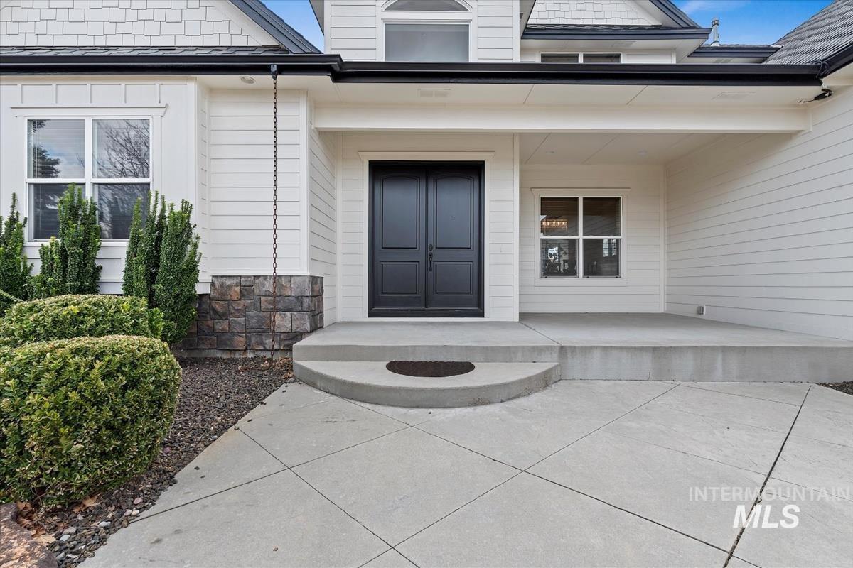Property entrance featuring a porch