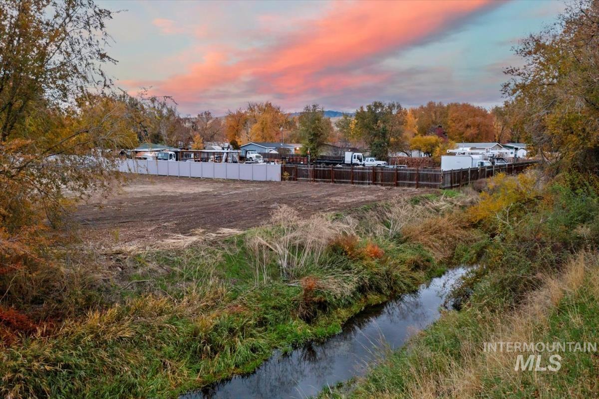 View of yard with view of wooded area
