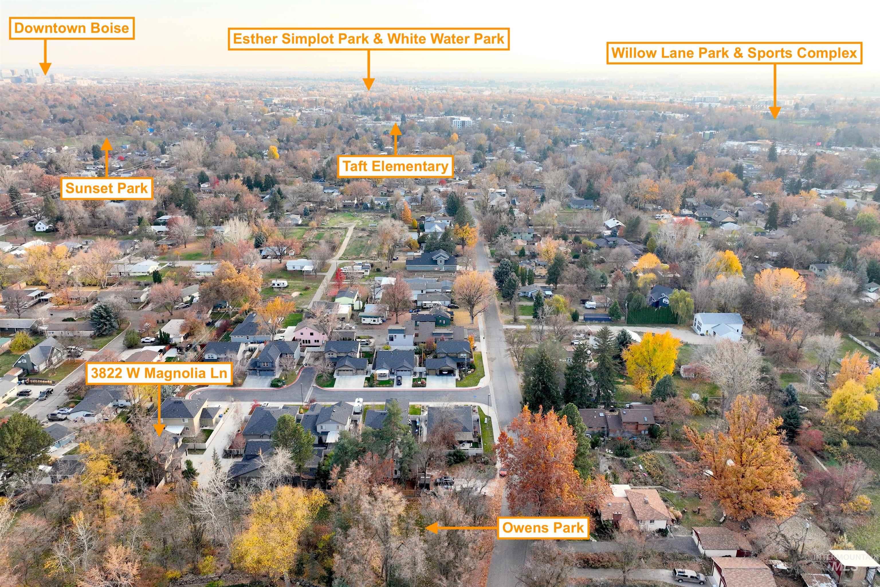 Aerial view of property's location with nearby suburban area