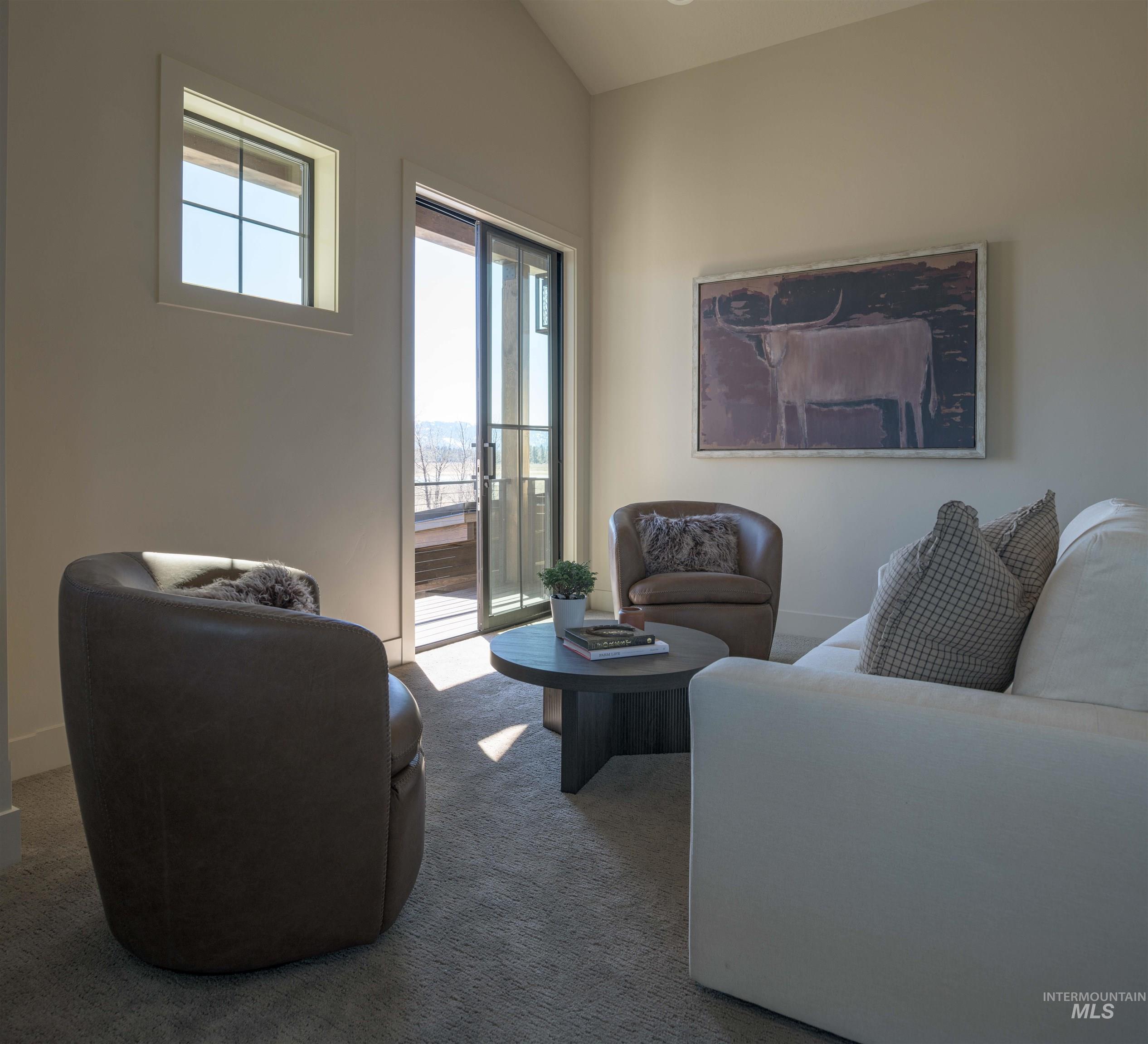 Second Floor Living room featuring carpet flooring and vaulted ceiling