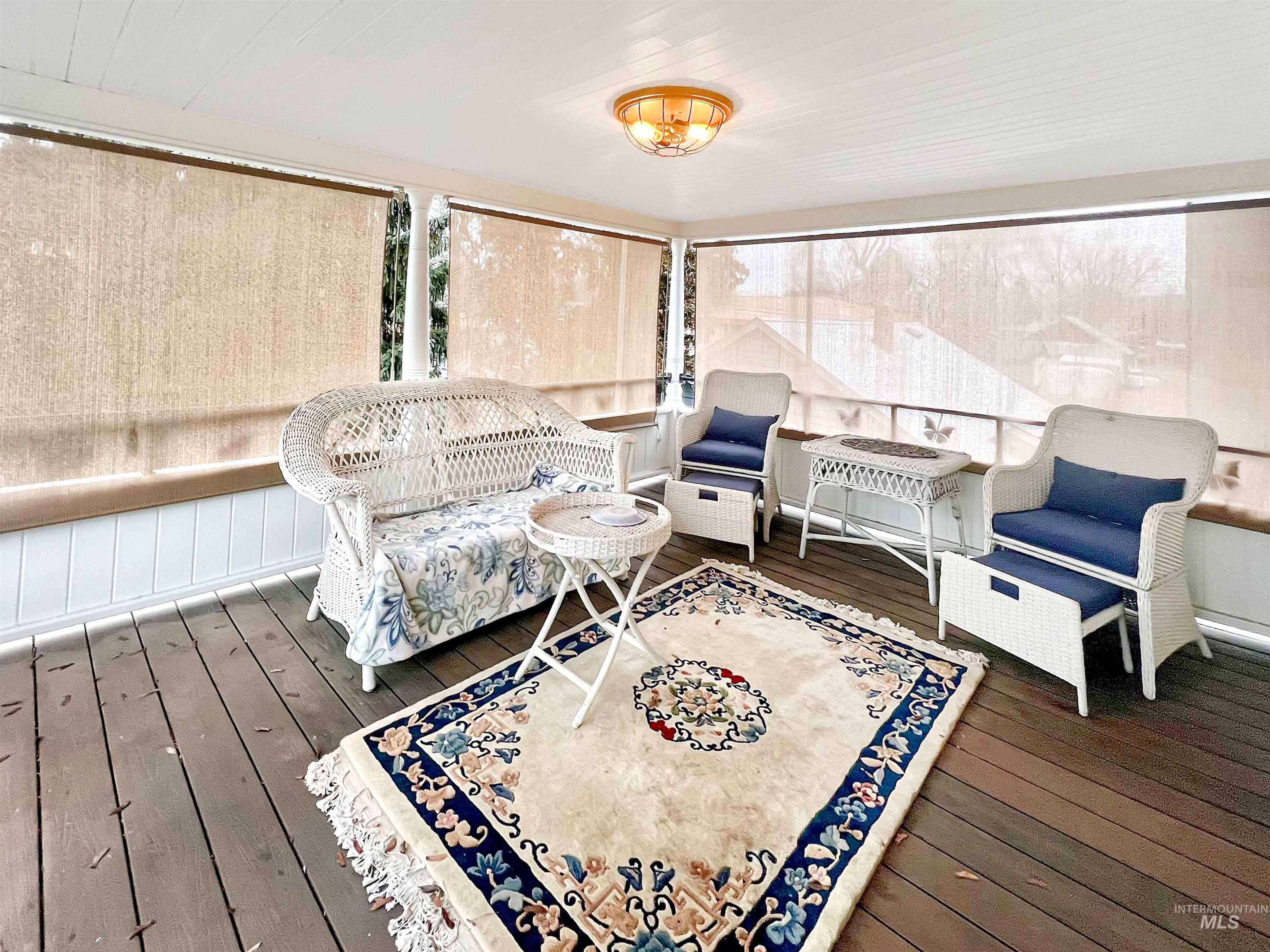Porch featuring a deck and plenty of natural light