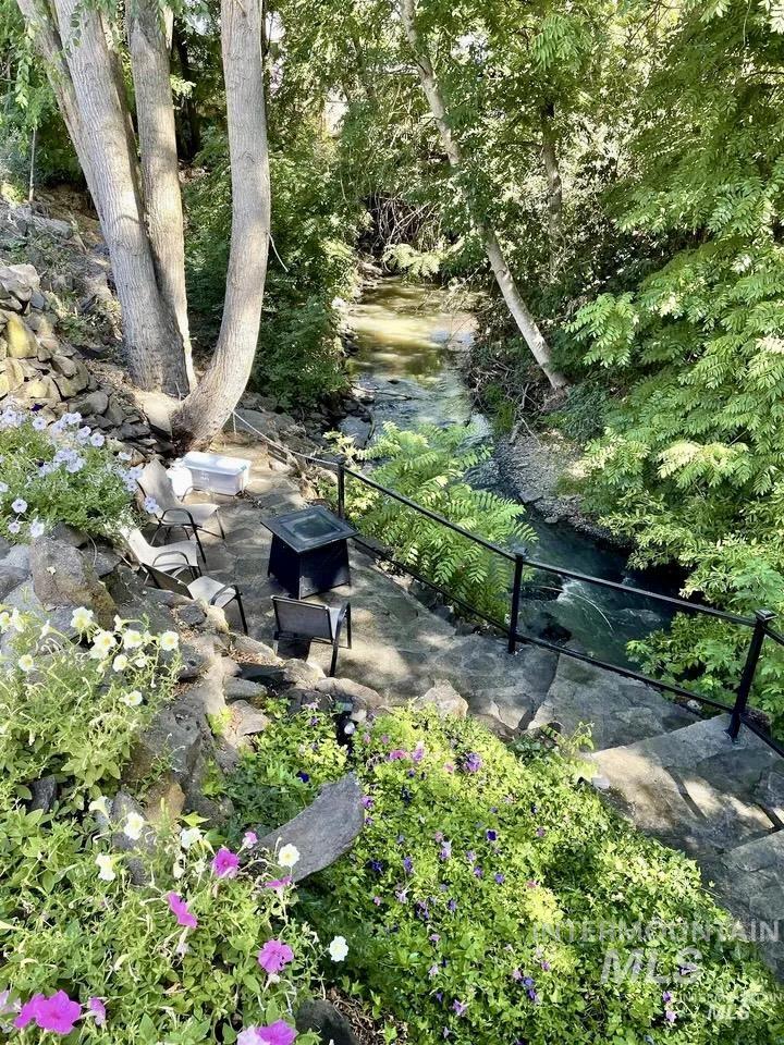 View of yard featuring a creek view