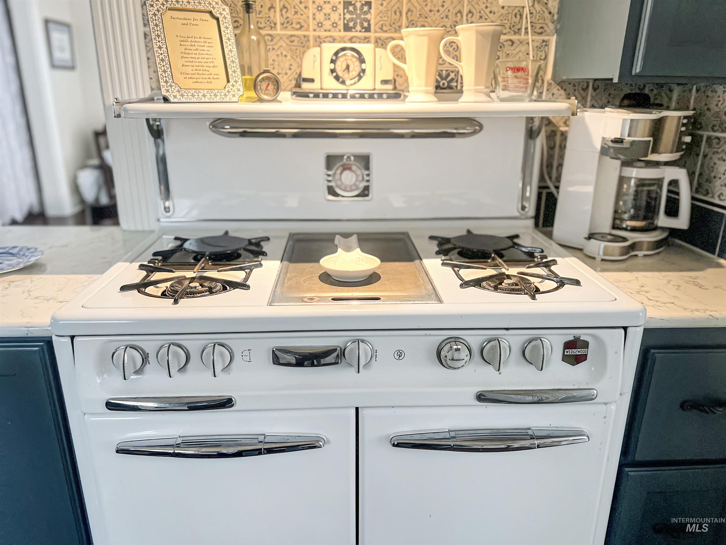 Kitchen view of vintage refurbished gas range with two ovens