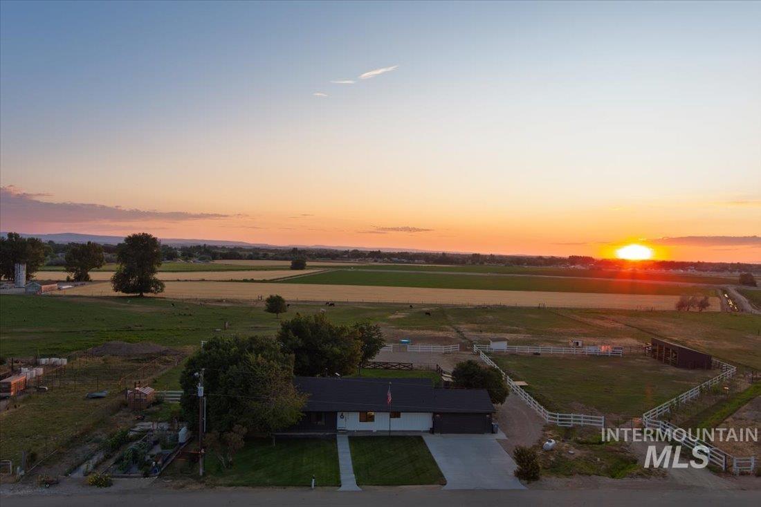 Aerial view of sparsely populated area featuring agricultural land