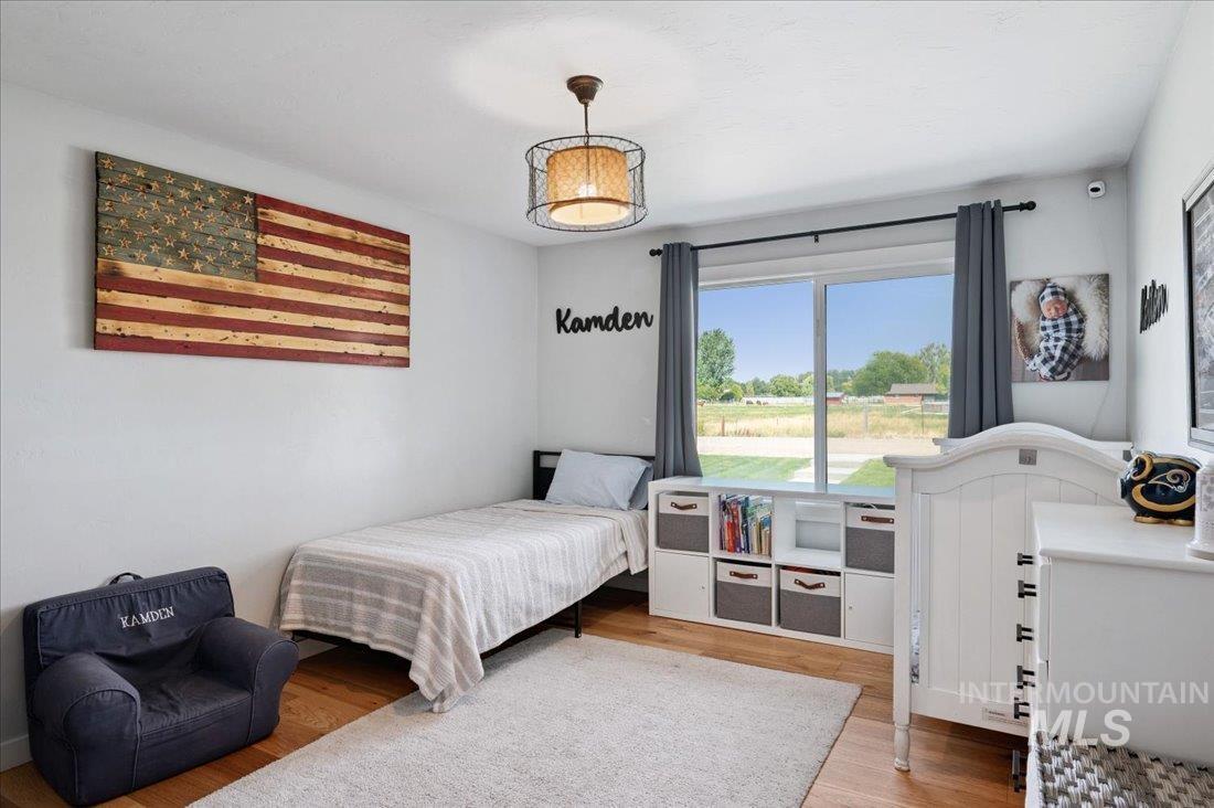Bedroom with light wood-style flooring
