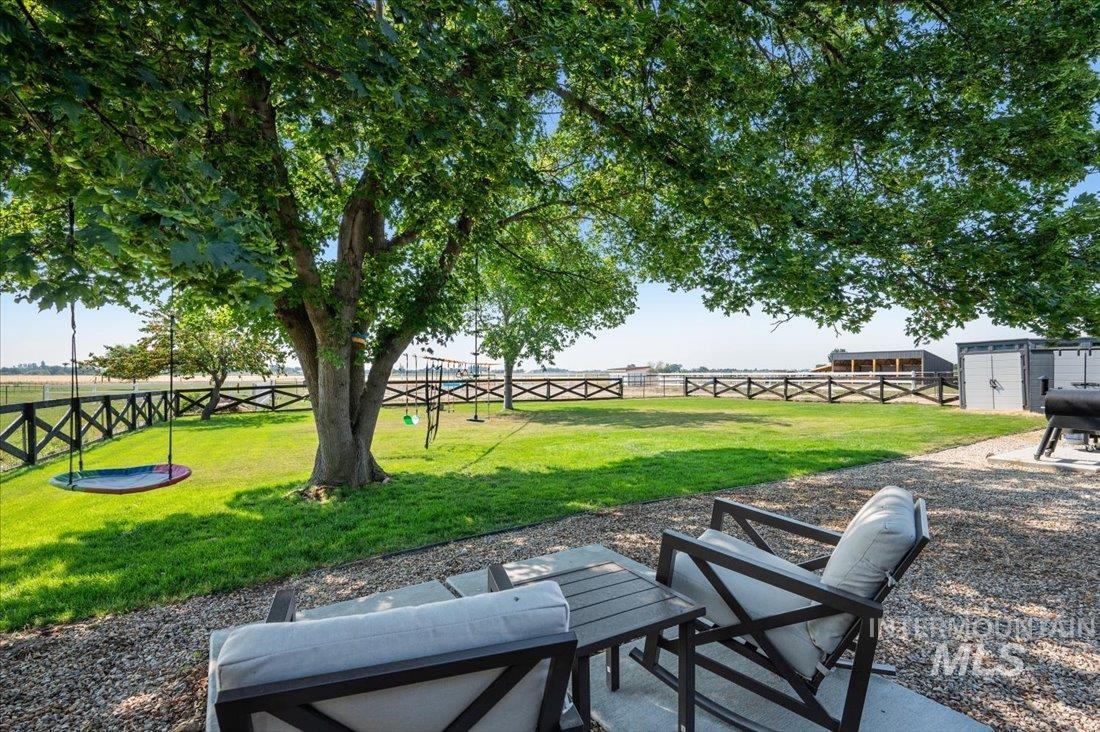 Fenced backyard featuring a patio area
