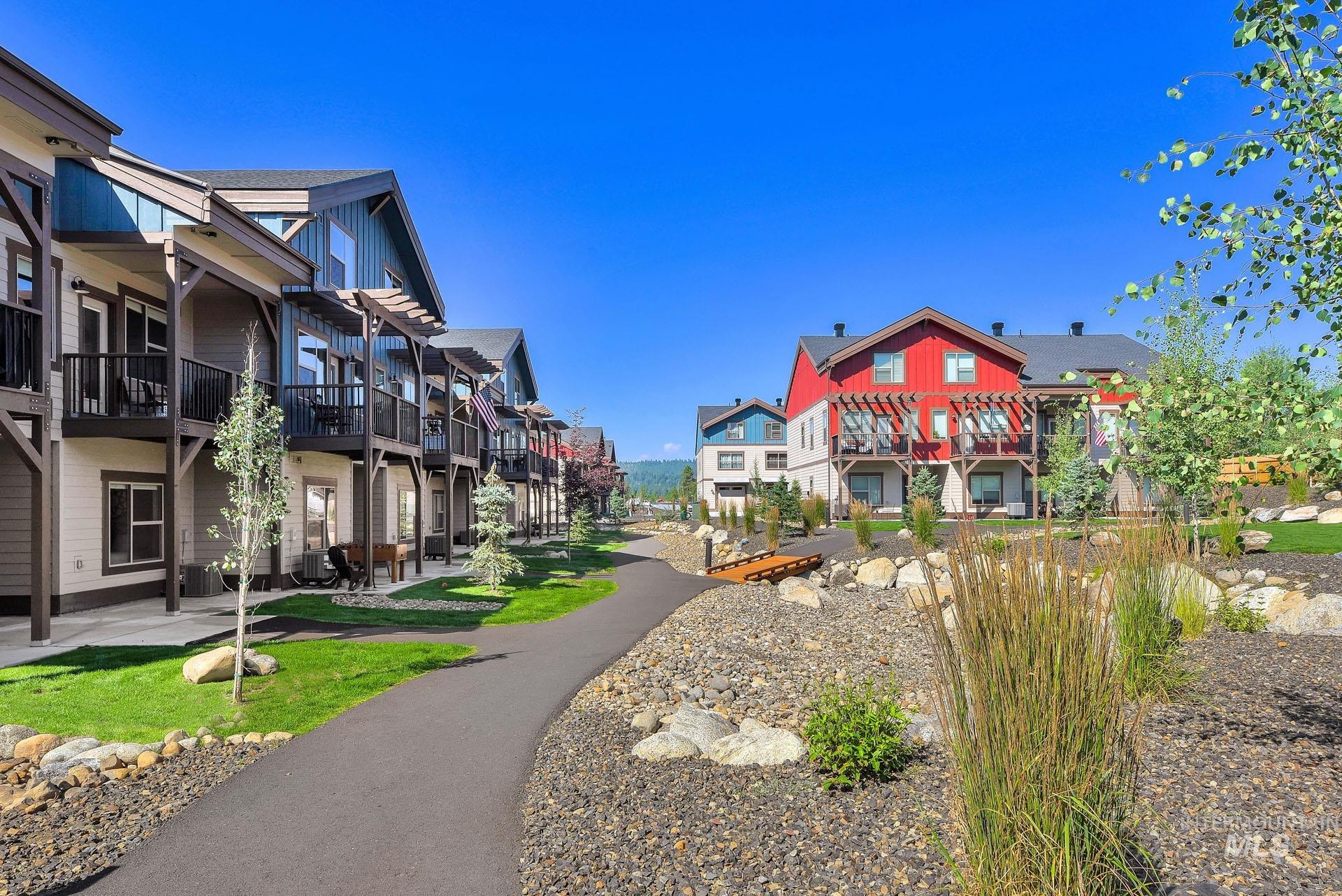 View of home's community with a patio area and a residential view