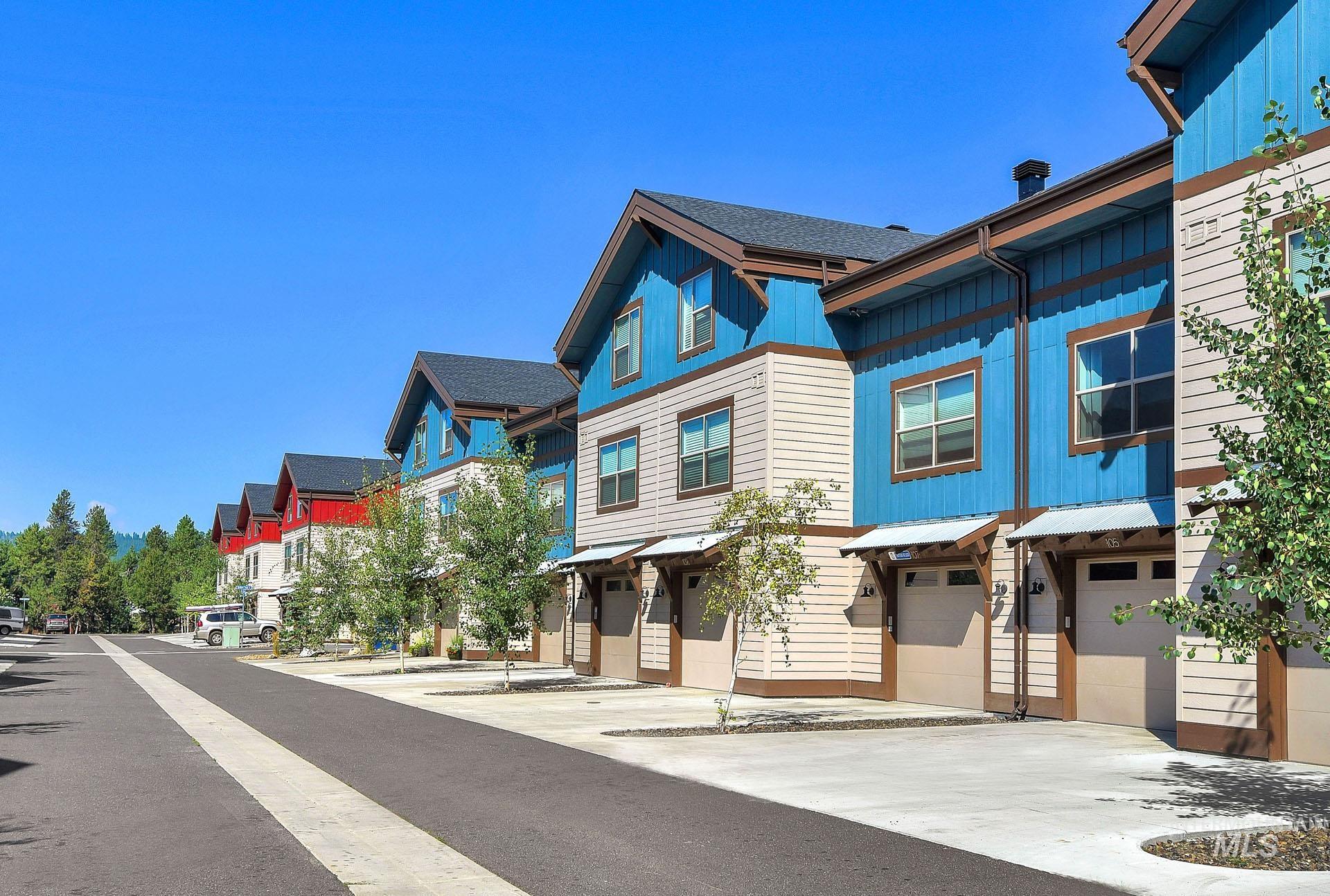View of asphalt street featuring a residential view