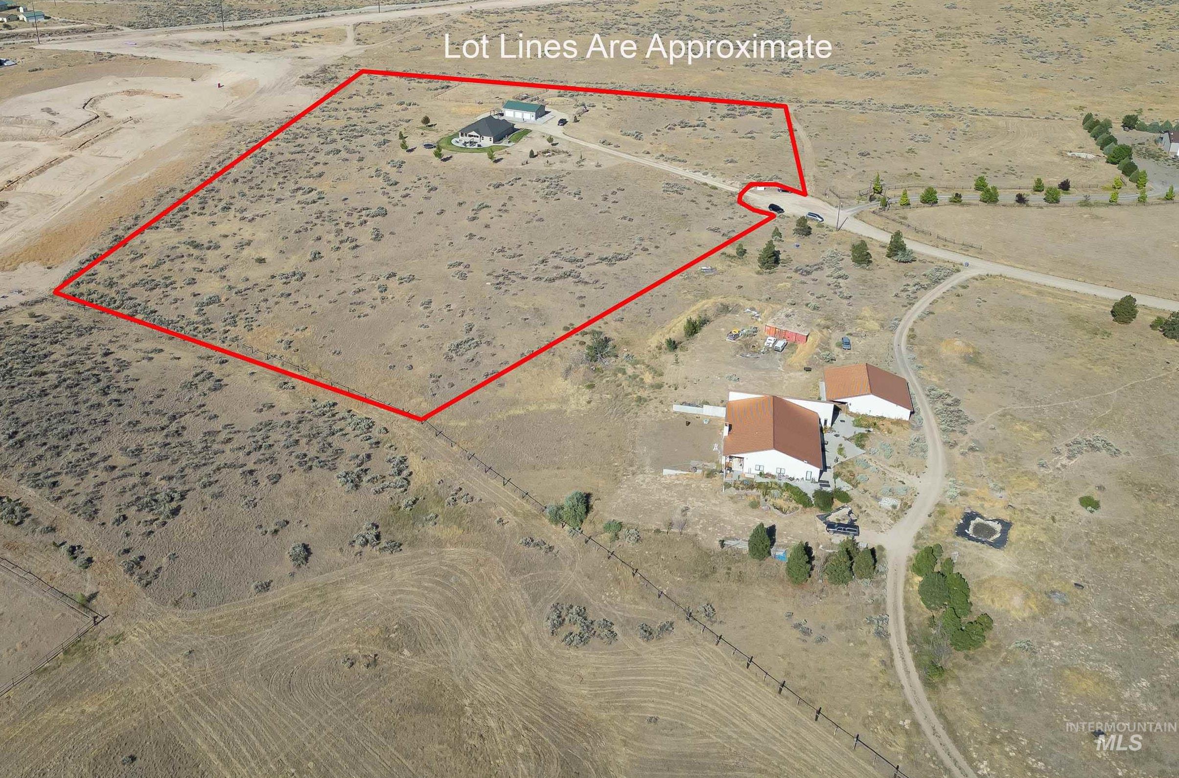 Overview of rural landscape featuring property boundaries highlighted and a desert landscape