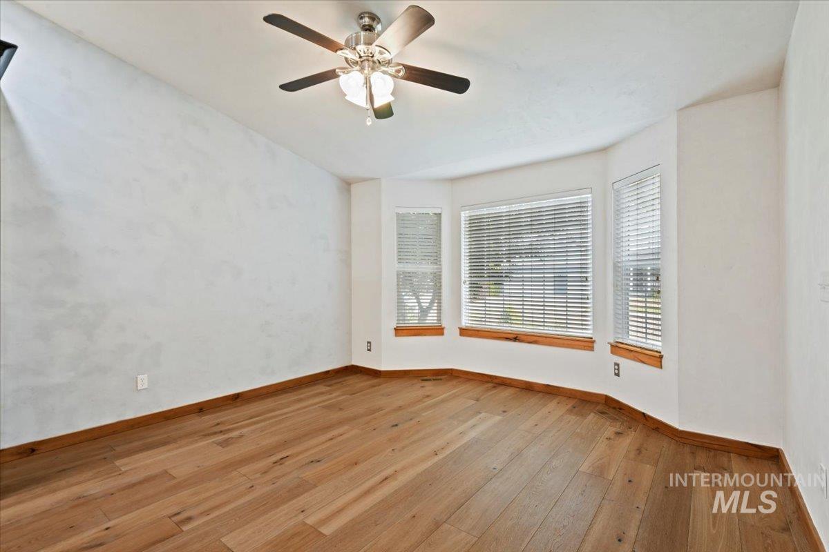 This space alongside the kitchen is perfect for a sitting area, extra dining space or flex space