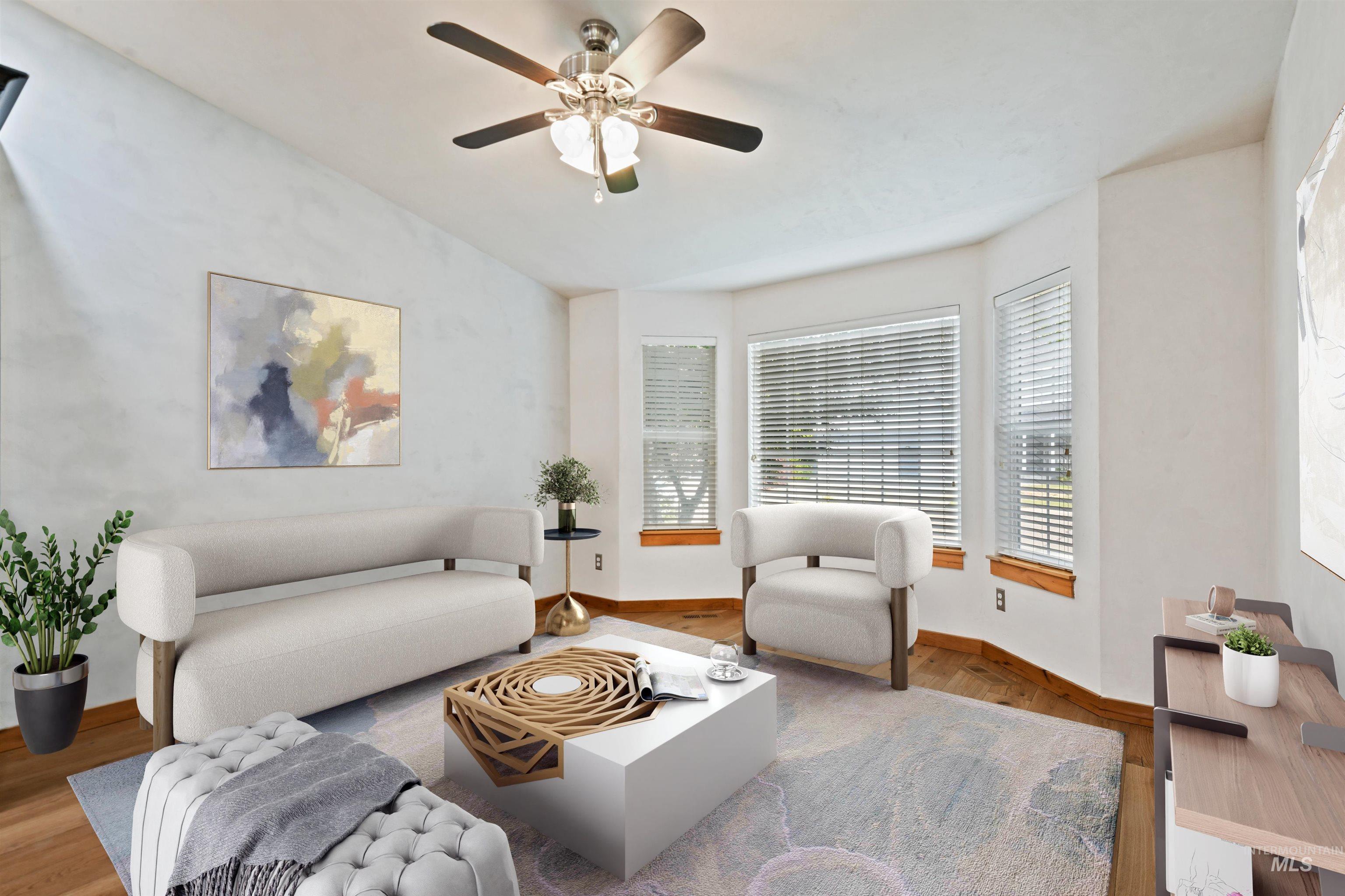 This space alongside the kitchen is perfect for a sitting area, extra dining space or flex space