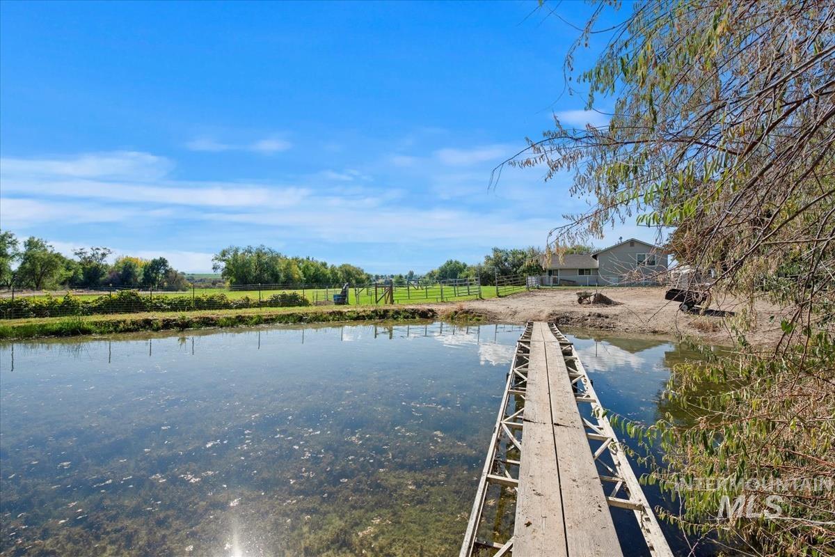 View of the home from the island in the pond