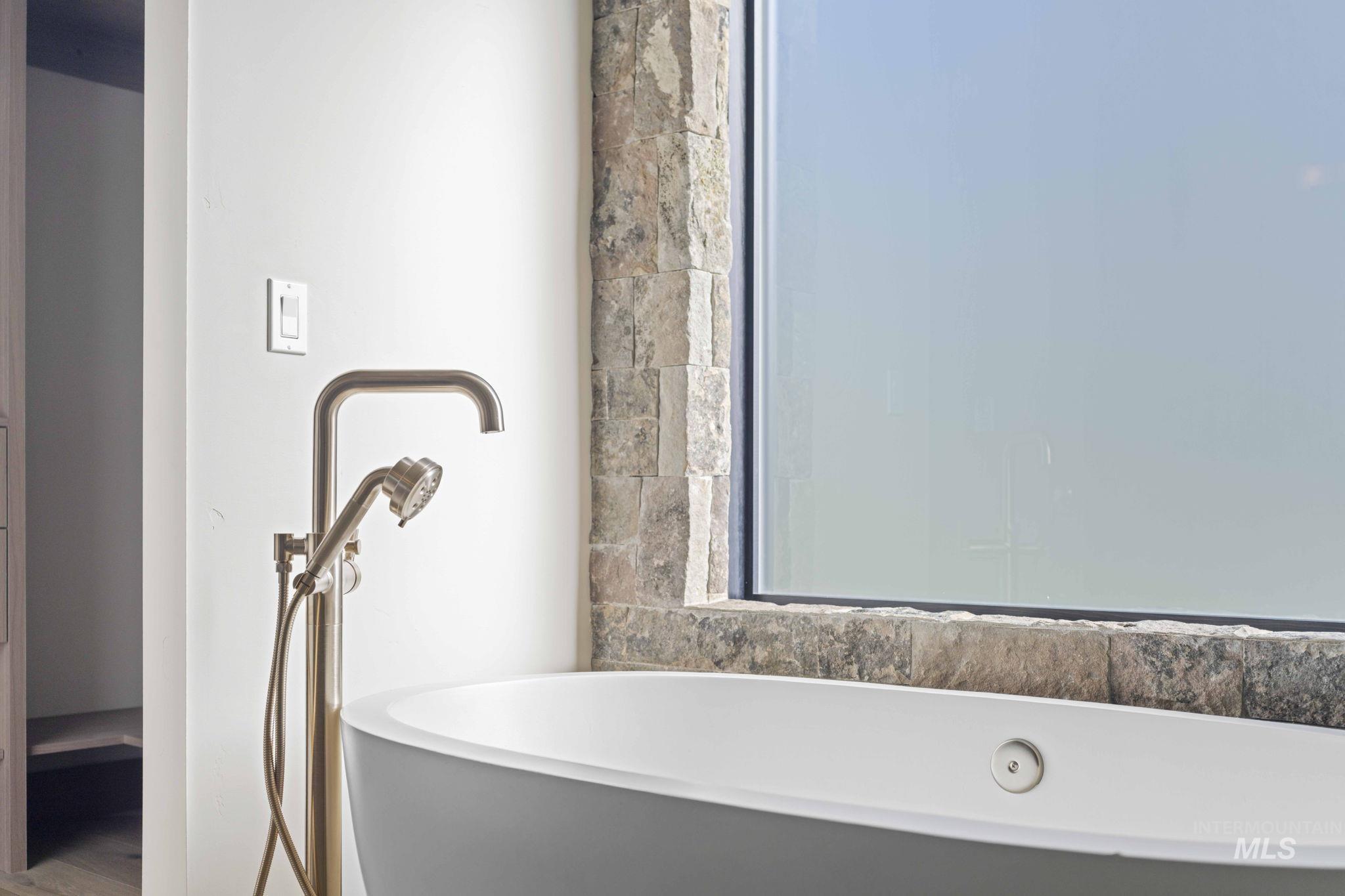 Bathroom with a freestanding bath