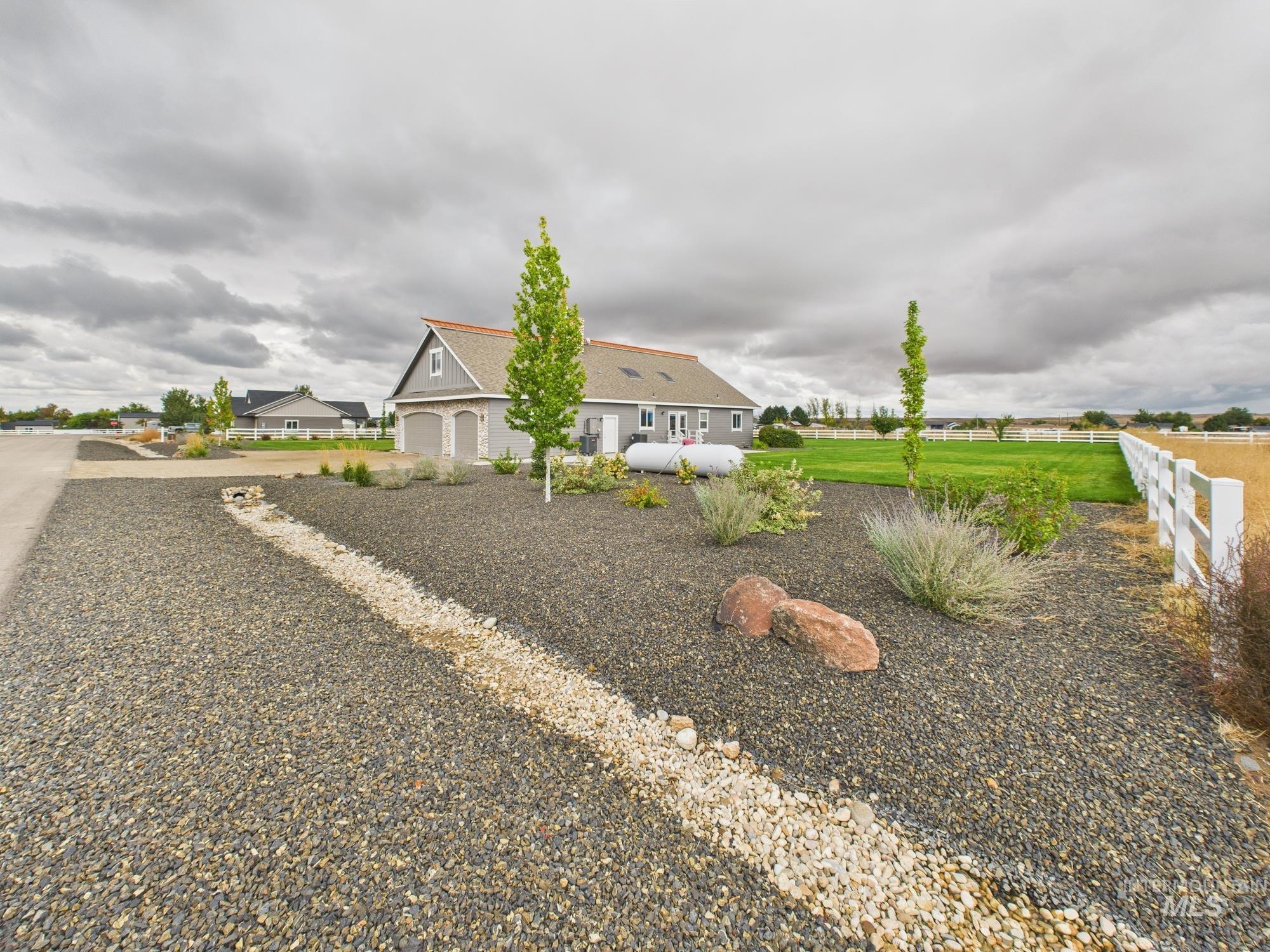 View of front of home featuring driveway