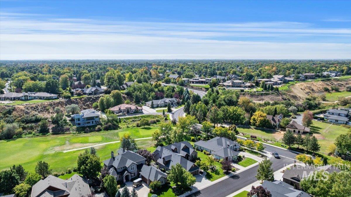 Aerial view of residential area with a local golf course